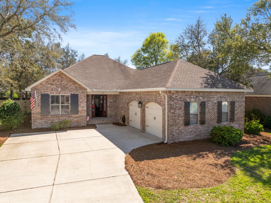 Welcome to your future home at 153 Black Bear Circle, nestled in the heart of the esteemed Preserve at Swift Creek neighborhood in Niceville, Florida. As the pioneering masterpiece by Huff Homes in this community, this property stands as a testament to quality craftsmanship and thoughtful design.This remarkable residence sprawls over a generous 2,107 square feet of living space, meticulously arranged for comfort and functionality. The house, constructed with all brick for durability and aesthetic appeal, occupies a spacious corner lot, affording ample outdoor space for leisure and gatherings.Step inside to discover a world of elevated living with tall ceilings that enhance the sense of space and grandeur throughout.