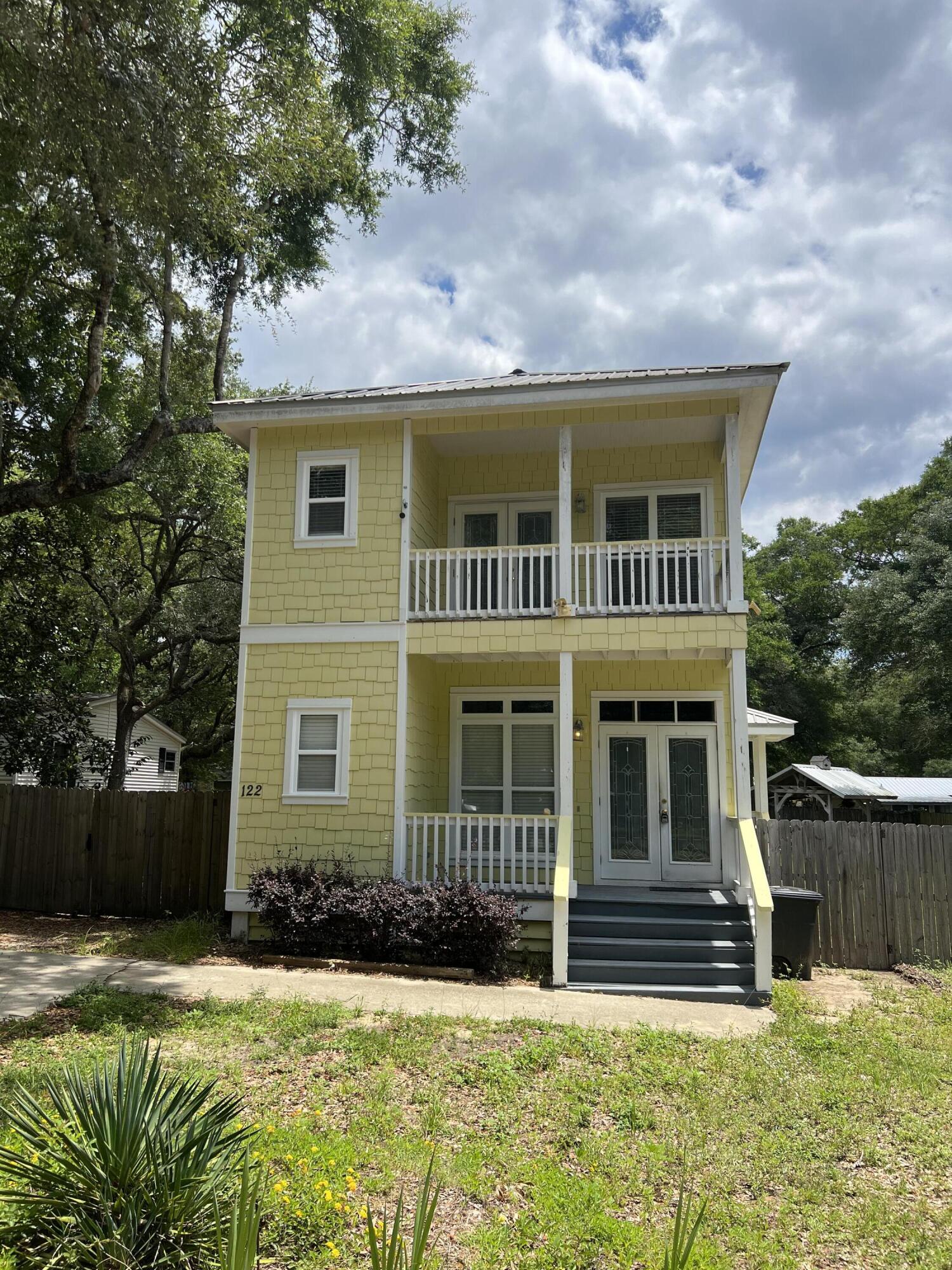 Looking for a private oasis with easy access to outdoor recreation? Look no further than this stunning 3 bedroom home located just a 3 minute stroll from Choctaw Beach boat ramp and park! Inside you will be greeted by old Florida charm with natural hardwood floors and a spacious family room. Kitchen provides plenty of cabinet and counter space making meal prep a breeze! The primary bedroom boasts a balcony for enjoying morning coffee and en-suite bathroom with soaking tub/shower. Outside, you will love time on the covered patio and very spacious back yard for outdoor activities or boat parking. Call today to view this property!