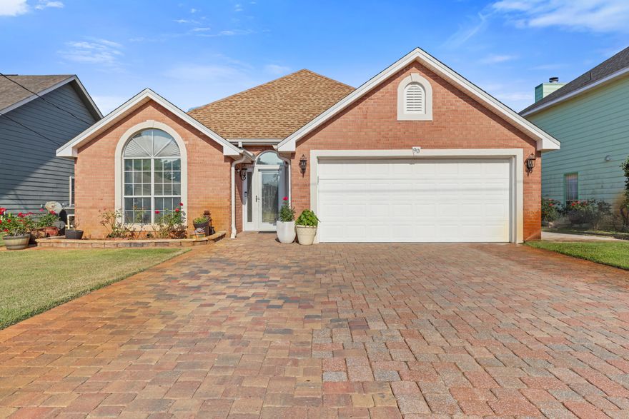 Enjoy serene lakefront living in this beautifully maintained 3-bedroom, 2-bath home available for rent. This charming residence offers an enclosed Florida room with scenic views of the lake, perfect for relaxing or entertaining. The home features tile flooring throughout, including in the sunroom and bedrooms, creating a clean, modern look with easy maintenance. The spacious great room showcases soaring 18-foot ceilings and a cozy gas fireplace. The kitchen comes fully equipped with granite countertops, an electric range, GE side-by-side refrigerator, and a separate walk-in pantry.  The home's exterior includes three sides brick with stucco accents and Hardiplank siding on the rear, along with a brick-paved driveway and a wood pergola over the back patio.