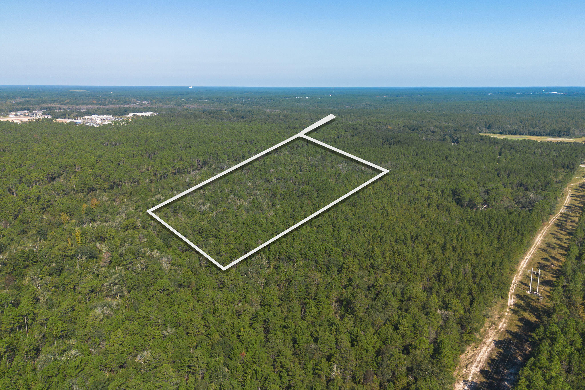 Calling All Investors, Builders & Land Developers! 20 Pristine Acres in the heart of Freeport which is quickly becoming the hottest investment spot in Walton County! Property has been un-landlocked with an ease of access directly from Joe Campbell Road. This ideal location is a hop skip and a jump from the heart of 30A but all you need is right next door with plenty of shopping and dining in this key location of Freeport situated in between Highway 331 and Highway 20E. With this much land in this prime location, the sky is truly the limit...ZONED AS: Estate Residential (ER) zoning in Walton County, Florida, allows a maximum of one dwelling unit per five acres. It also limits non-residential intensity to 25% FAR and 30% ISR.