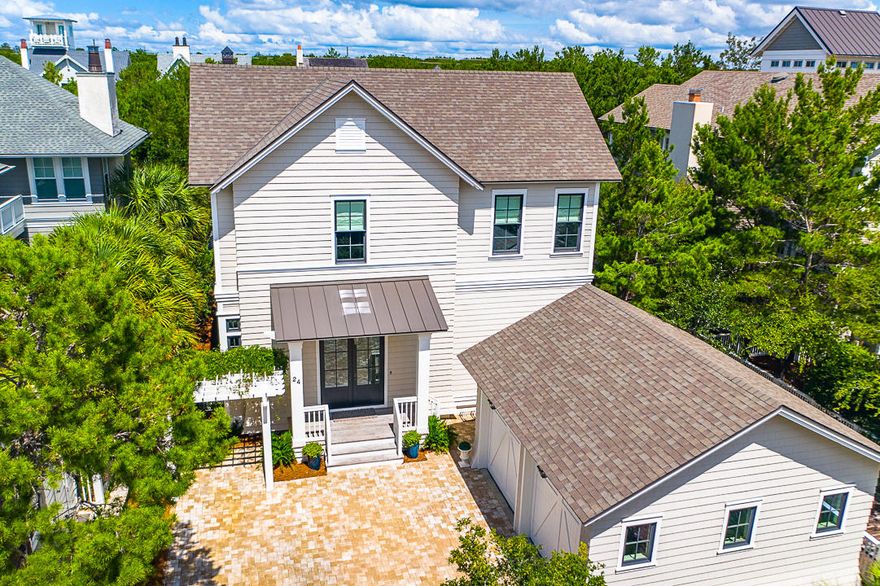 Quality craftsmanship and attention to every detail exude from this magnificent home in the Gulf-front, access controlled neighborhood of WaterSound Beach. Custom built & designed for easy beach living, this home has all the right details: large living/dining/kitchen combo that encompasses the entire rear of the home,  spacious kitchen with large center island, custom cabinetry wolf/sub zero appliances, wine bar and an exorbitant amount of counter space. The main level also includes 2 porches, outdoor grilling area , laundry room and master suite.   The second level of the home boasts 3 large bedrooms, 3 full-baths, a full-size bunk room & a large media/multi-purpose room.  Additional features of this magnificent home include a double garage, outdoor storage closet, Ipe wood decks,