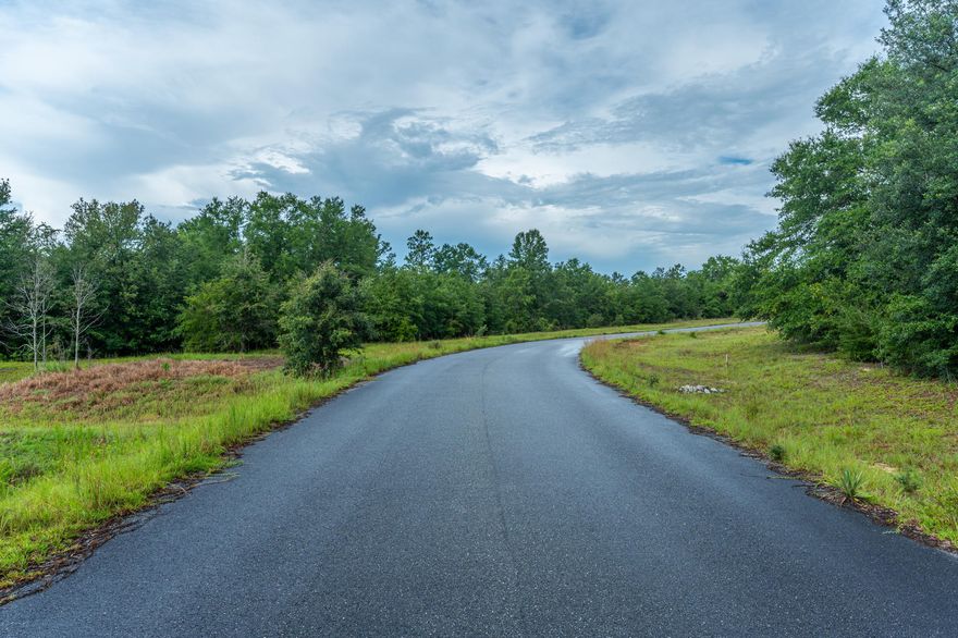 This property is a paradise for farming enthusiasts! With endless opportunities to build your dream home and enjoy the majestic beauty of the land, you won't want to miss out on this one-of-a-kind opportunity. The property has limited covenants and restrictions, And with plenty of space to hunt and ride ATVs, you'll never run out of things to do. Take a moment to relax on the front porch and enjoy the stunning views of the Oak trees, and revel in the convenience of being located in the heart of North Baker, just a short distance from the Baker School, local shopping, and beaches. Don't let this incredible opportunity pass you by!
