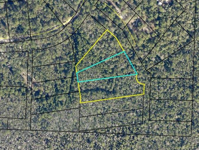 If you're looking for the perfect place to settle down with plenty of privacy, this lot is a great option! It has 1.10 acres and is located conveniently off of 1-10 in Holt, giving you that ''off the beaten path'' lifestyle you've been dreaming about. Both lots on either side of the property are also for sale, giving you the opportunity to own close to 3.5 acres!