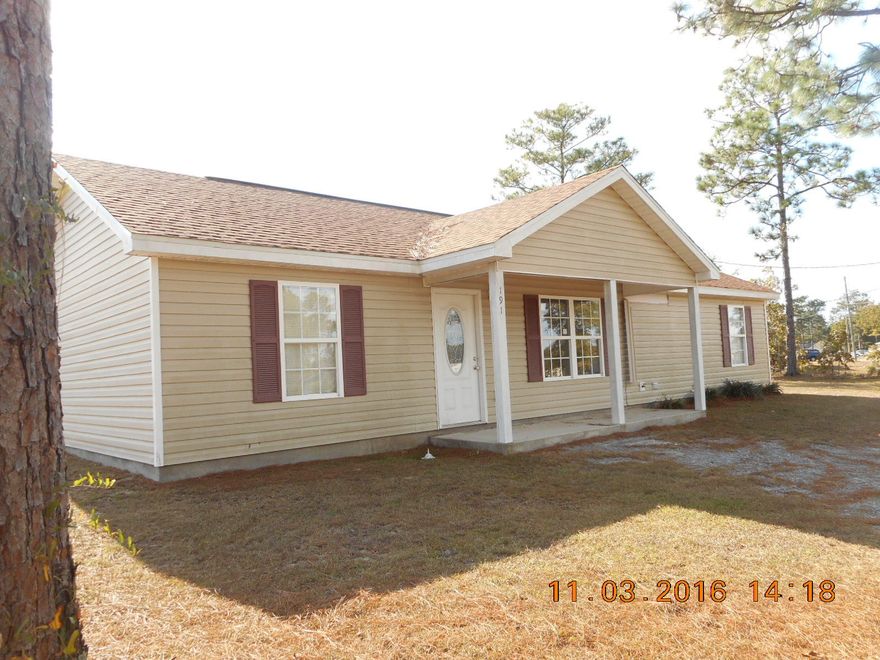 This REO property is neat as a pin and affordably priced. Vinyl siding home is in town near schools and amenities. It fronts paved road and on a corner lot. Privacy fence in back yard. The home is in excellent condition. It has the split bedroom floor plan. Modern kitchen with smooth top stove, side by side refrigerator, microwave, and dishwasher. Double sinks in Master Bath. Home is total electric. Got to see it to appreciate. Four year old home is great price. Call for a showing today!