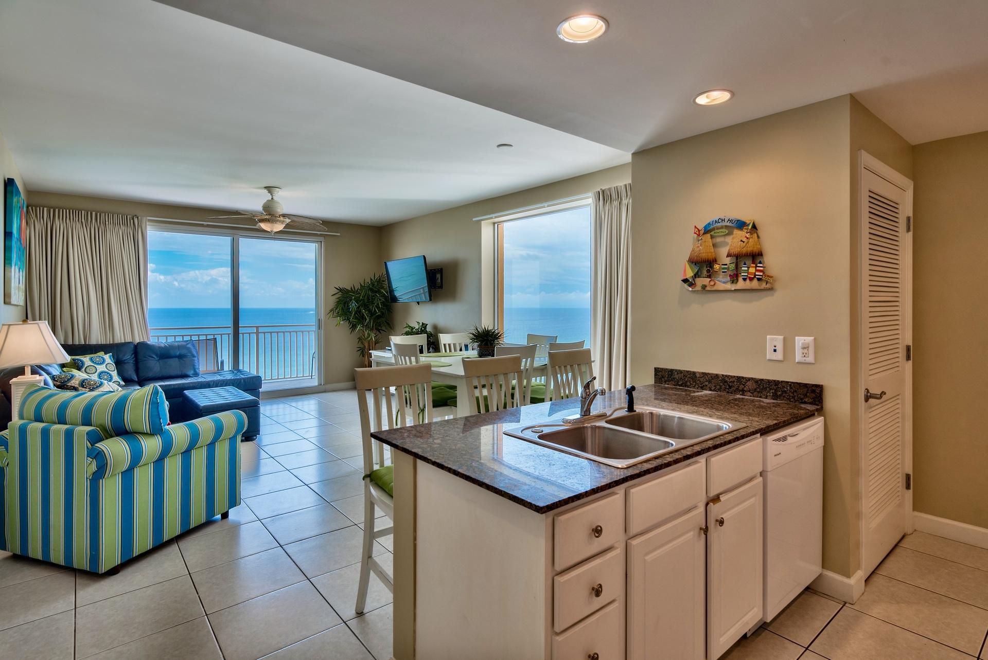 Phenomenal opportunity to own a 3-bedroom corner unit with one of the most desirable floor plans at Splash! This is the ''Paradise'' floor plan totaling 1,702 square feet with two Gulf front master bedrooms, 3 private balconies, 3-bathrooms and a separate lockout suite complete with a kitchenette! This unit is being sold fully furnished and decorated with high-end decor and flat screen TVs. Interior features raised ceilings, an open floor plan, and large sliding glass doors enhancing the Gulf views. The kitchen has granite countertops & breakfast bar, and ample cabinet space. Enjoy Gulf views from the kitchen, dining & living area and relax in luxury. There are two Gulf front master bedrooms with private balconies, one features a king bed, walk-in closet and en-suite bathroom with granite countertops, double vanities, garden tub and separate walk-in shower. The second master suite offers a queen bed and bunk beds along with an en-suite bathroom with pedestal sink and shower/tub combo. There is an additional guest quarters which is a unique feature as it has its own lockout entry, which is perfect for privacy and rentals. This room has a built in kitchenette with a mini-fridge, granite countertop, and dining area. There is an en-suite bathroom with granite and shower/tub and a private balcony with Gulf views. The unit is being sold fully furnished & decorated and there is a stackable washer & dryer included. This is the perfect full-time residence, second home or vacation rental. It is currently being rented by the on-site rental company and has incredible rental income - see attached Cost to Own for more details.
Splash Resort is a one-stop destination with luxurious amenities to cater to your every need. The resort is very family friendly with an expansive covered water park filled with multiple pools, a playground, water slides, fountains, splash areas and interactive toys including a bucket that fills with water. There is a Gulf front pool, sun deck, hot tub and lazy river not to mention a poolside bar & grill and shave ice for convenience. Splash has a designated boardwalk to the beach and seasonal beach rentals. Enjoy the Gulf front exercise room with state of the art equipment, indoor arcade, lounge area, and covered skyway from the parking garage. The resort is located on the desirable West end of Panama City Beach close to upscale communities like Rosemary & Alys Beach and also not far from Pier Park in Panama City Beach. Do not miss out on this incredible opportunity!