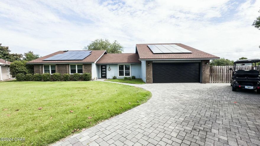 This Bay Point gem offers a VA assumable mortgage at just 2.875% for eligible buyers! Enjoy ultra-low power bills (under $30/month) thanks to solar panels, energy-efficient windows, and a new roof. The updated kitchen features quartz countertops, while luxury vinyl plank flooring adds elegance throughout. Spacious living areas, a bonus room, and a screened-in pool with a lanai provide the perfect setting for Florida living. Located in a gated cul-de-sac, the community boasts a Jack Nicklaus golf course and full-service marina, all near the beach, shopping, and the Navy base. Don't miss out on this energy-efficient oasis!