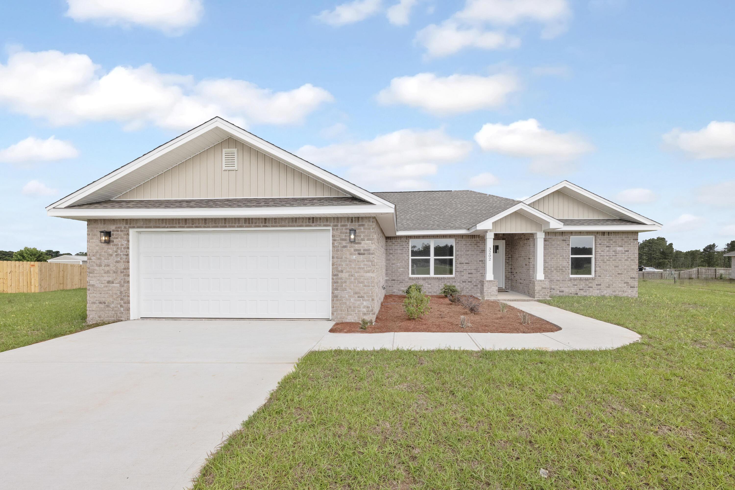 All Brick Home Built by Local Parade of Homes award winning builder. Seller will pay towards buyers closing costs.HALF ACRE LOT! 4 bedrooms, 2 baths. Upgraded Lighting Package and Ceiling Fans in all bedrooms. Luxury Vinyl Plank throughout and NO CARPET. A gorgeous light and bright palette of white and light gray/rustic flooring. The kitchen features an oversized island with undercounter sink, quartz countertops, and stainless steel appliances. The Master Bathroom has double vanities, a large soaking tub and a separate shower with seat. Our garages are finished, painted walls, pull down attic stairs and automatic garage door openers. Large Driveway and HUGE half acre lot. Preferred lender can close in three weeks.