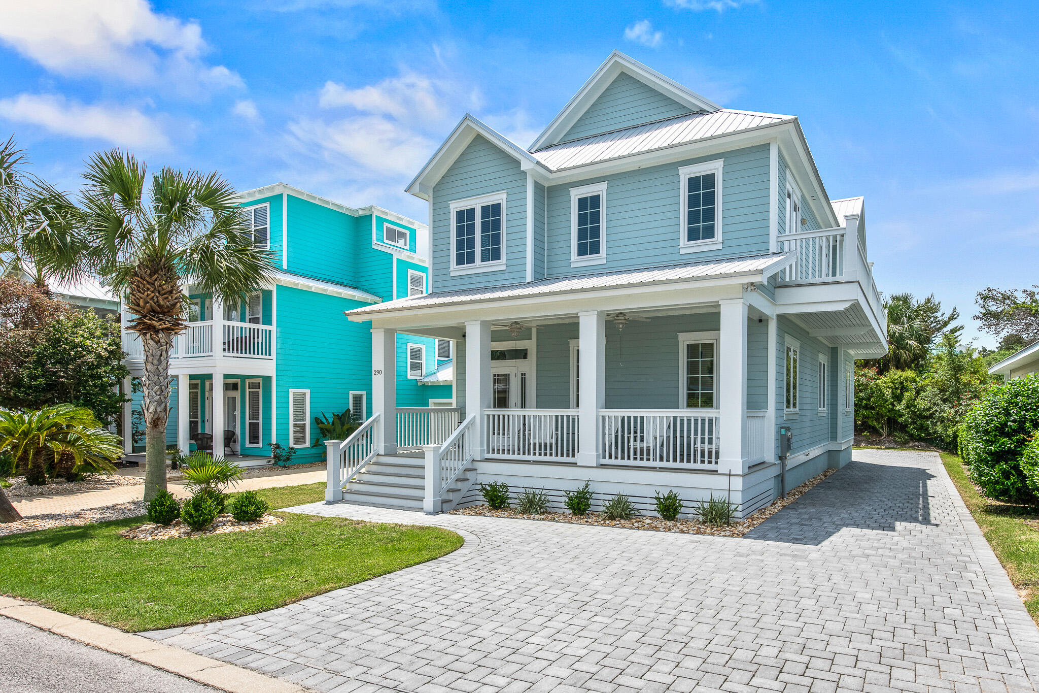 This beautiful 4 bed, 3.5 bath home is in Ventana Dunes neighborhood on 30A in Blue Mountain Beach. The home was built in 2018, used as a secondary residence by original owners - never rented. Walk up a few steps to a spacious, elevated front porch to enjoy mornings or evenings in this quaint neighborhood. Enter to find 10 ft ceilings in both the first and second floors of the home including cypress wood ceiling inlays in select rooms. Throughout the home, you'll find distressed-style wide-plank tile floors. The first floor includes an open concept dining and living room flanked with columns and a state-of-the-art, eat-in kitchen with ss appliances including an LG refrigerator, stove with pot filler, white cabinetry, tile backsplash and granite counter tops.