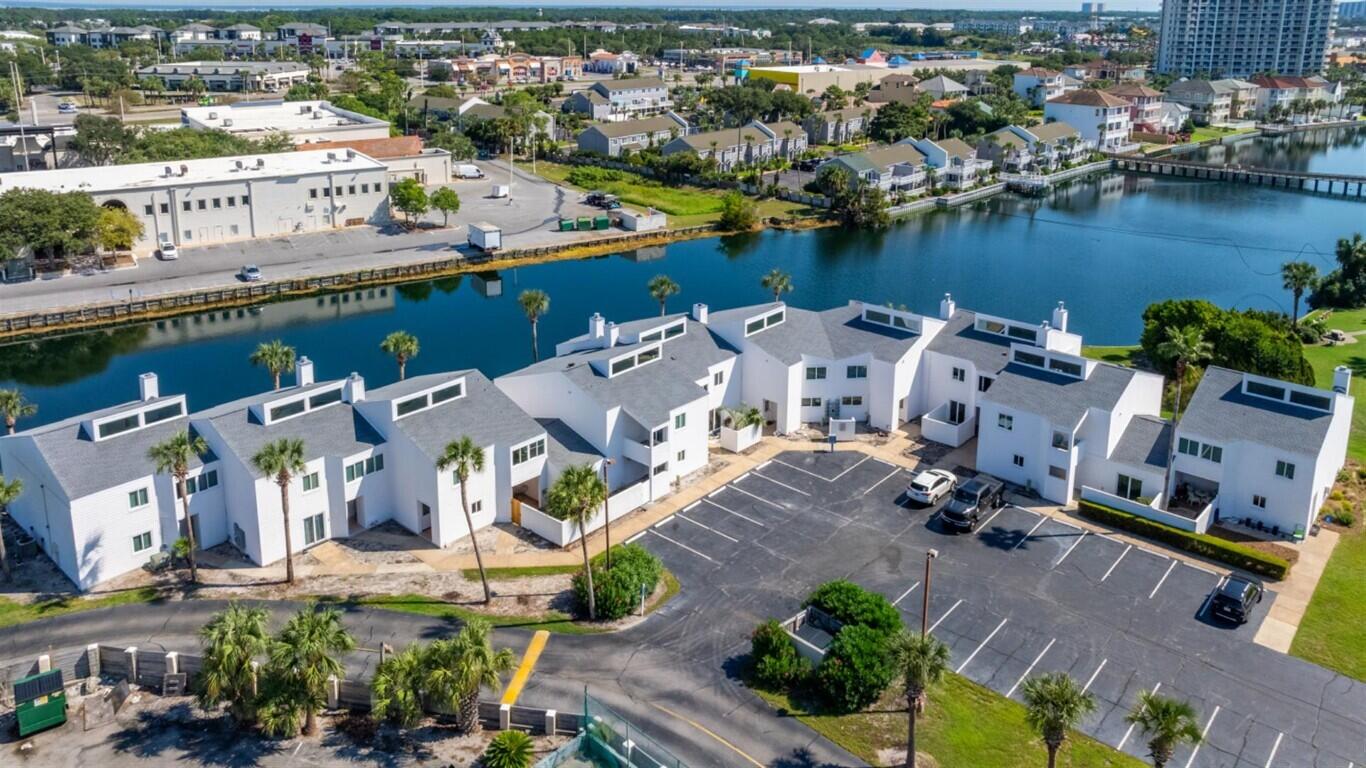Holiday Isle Townhome with Flexible Lease, Remote-Work Ready, Snowbirds! Available today through January 31, 2025Relocating, taking a break from the snow, or working remotely? This fully remodeled Holiday Isle townhome is designed for comfort, convenience, and flexibility, offering lease options ranging from 2 to 4 months with start dates that suit your schedule. Rent directly from the owner and avoid management company fees.Inside, you'll find two bedrooms and 2.5 bathrooms, including a master suite with a king bed and a second bedroom with two full beds. The second bedroom also features a bonus room with a twin bed and desk overlooking the lake, equipped with an independent mini-split AC, making it an ideal spot to work remotely without disturbance. See more: Shoreline Towers is conveniently located near shopping, dining, and entertainments. Available to you are heated in-ground pool with handicap lift, picnic area with charcoal grills, clubhouse with workout center, tennis court, pickleball courts, and 450 feet of deed beach with handicap ramp access.