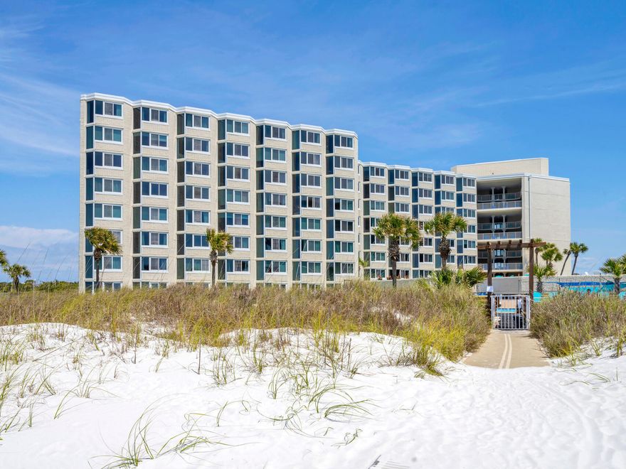 Welcome to this must see gorgeous turnkey first floor vacation rental unit that is beautifully updated and decorated. This unit has a great patio for outdoor entertaining and convenient to the pool/amenities/beach! Updates include new flooring, bathroom, HVAC & hot water heater in 2022, kitchen including new countertops, backsplash, stove & refrigerator. Top of the Gulf has completed extensive updates including windows, doors, handicap accessible ramp to beach and exterior floor epoxy. Top of the Gulf has wonderful amenities including a spacious pool, tiki bar, sun decks, shuffle board, fitness center & game room.