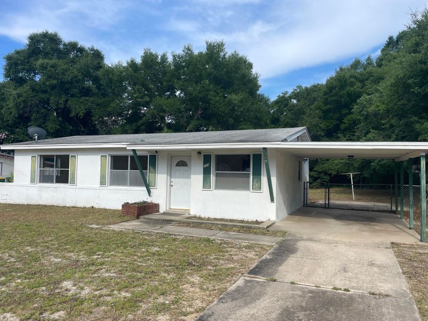 AMAZING opportunity to steal this Mary Esther home for under $200K! WOW! Located in the heart of Mary Esther, this 3 Bedroom / 1 Bathroom home is the perfect mid-century fixer-upper for you to either make it your own, flip it or keep as an investment property! This is the perfect opportunity for you to put in some elbow grease and end up with a stellar property and a ton of equity! HUGE fenced-in backyard, carport, and a pink bathroom that will definitely be a conversation starter. ;) Not to mention just a 5-minute walk across the street to the public dock and boat ramp! Great bones and foundation on this one - It's perfect for the 'do-it-yourselfer'. Don't wait because at this price it definitely WILL NOT LAST LONG! **CASH OR CONVENTIONAL BUYERS ONLY**