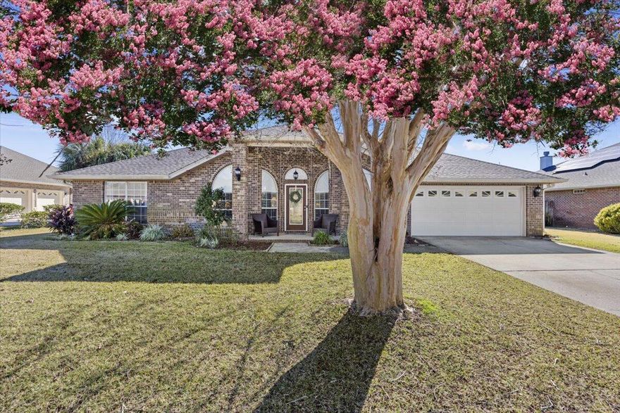 Welcome to your peaceful retreat in Woodlawn Heights! This meticulously maintained, 4-bedroom, 2.5-bath home offers 2,548 square feet of move-in ready comfort in a quiet Gulf Breeze neighborhood.Inside, neutral colors and high ceilings create a bright, airy feel. The spacious great room features a cozy corner fireplace. The inviting kitchen has a breakfast bar, granite counterttops, updated stainless steel appliances  and flows seamlessly into the dining area. The primary suite is a true sanctuary with a spacious bedroom, ensuite featuring double sinks, a soaking tub, a separate shower, and 2 walk-in closets.Your private backyard paradise features a heated saltwater pool (installed in 2022) that backs to no rear neighbors, with pond views, setting the tone for serene relaxation an