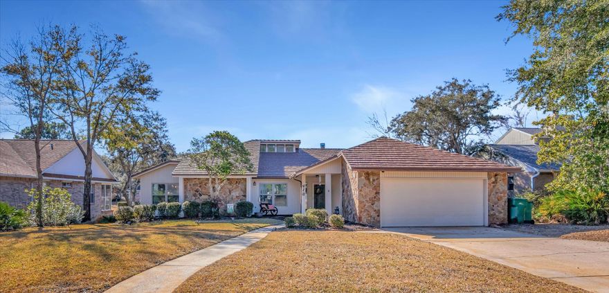 Welcome home! Charming 3 Bedroom/ 2 Bath home located in the highly desirable neighborhood of Bluewater Bay. Enjoy vaulted ceilings in the Dining area that can also easily be converted to an additional living space. Updated kitchen includes granite countertops, updated cabinets and new Samsung Touchscreen refrigerator. Laundry space located in kitchen is tucked neatly away behind beautiful, newly-installed hinged barn doors. Love to entertain? This home has you covered! Gather your friends and family in the large entertainment area/ living room with beautiful views of one of the many Bluewater Bay neighborhood ponds. Large bar with mounted TV in living room area does convey with property (if desired). Home has laminate flooring and tile throughout. No carpet!