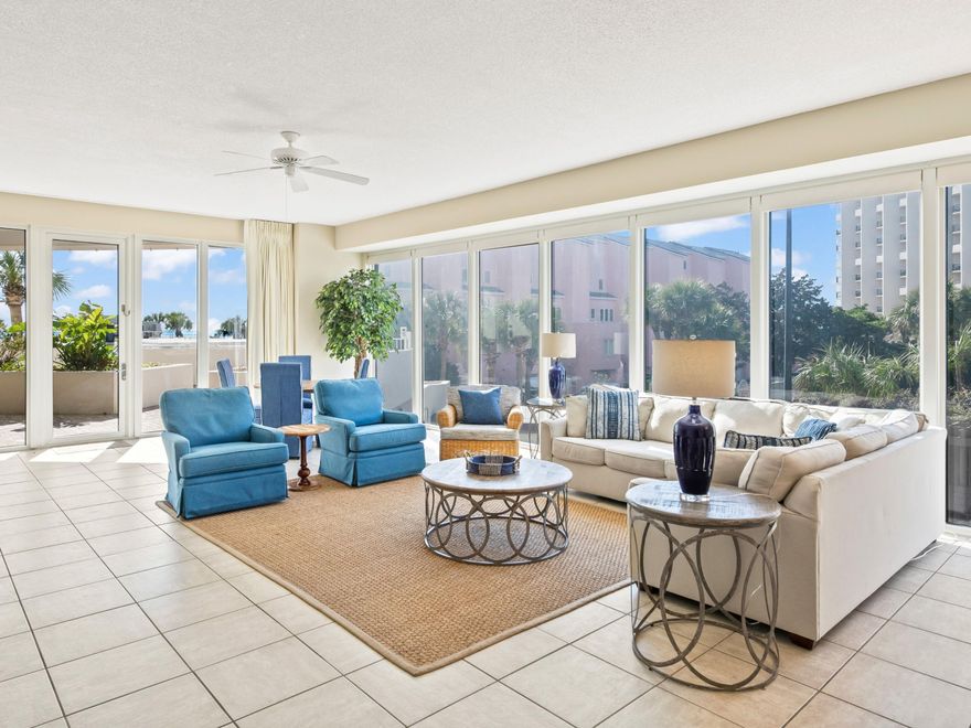 Unparalleled proximity to resort amenities and the emerald green waters of the Gulf of Mexico are made possible thanks to this convenient first floor condo within the gated community of TOPS'L Beach and Racquet Resort. Providing a spacious floor plan with three bedrooms, an open living/dining space and an oversized outdoor terrace, this corner unit offers a truly unique ownership experience for those looking for a turn-key coastal lifestyle. Floor to ceiling windows adorn the western wall of the condo, providing endless natural light to flow throughout the property, while 10 foot ceilings, a private covered parking space and a Gulf-front master suite create an idyllic blend of convenience and comfort. Located in the Tides building of Tops'l Resort, owners can enjoy newly resurfaced walkways and balconies as well as a new pool deck and fencing and freshly painted building exterior thanks to a recently completed $5 million renovation.  The Tides at Tops'l offers a Gulf-front pool, a spacious sun deck, hot tub, shuffleboard, basketball, and two rubico tennis courts.  

Tops'l Beach and Racquet Resort offers world-class amenities that include 600 feet of beachfront, a fitness club with 12 rubico tennis courts, on-site tennis pros, racquetball, aerobics, on-site massage therapy, swimming pools, steam and sauna rooms, a whirlpool, gated entry, security as well as an on-site bar and restaurant.