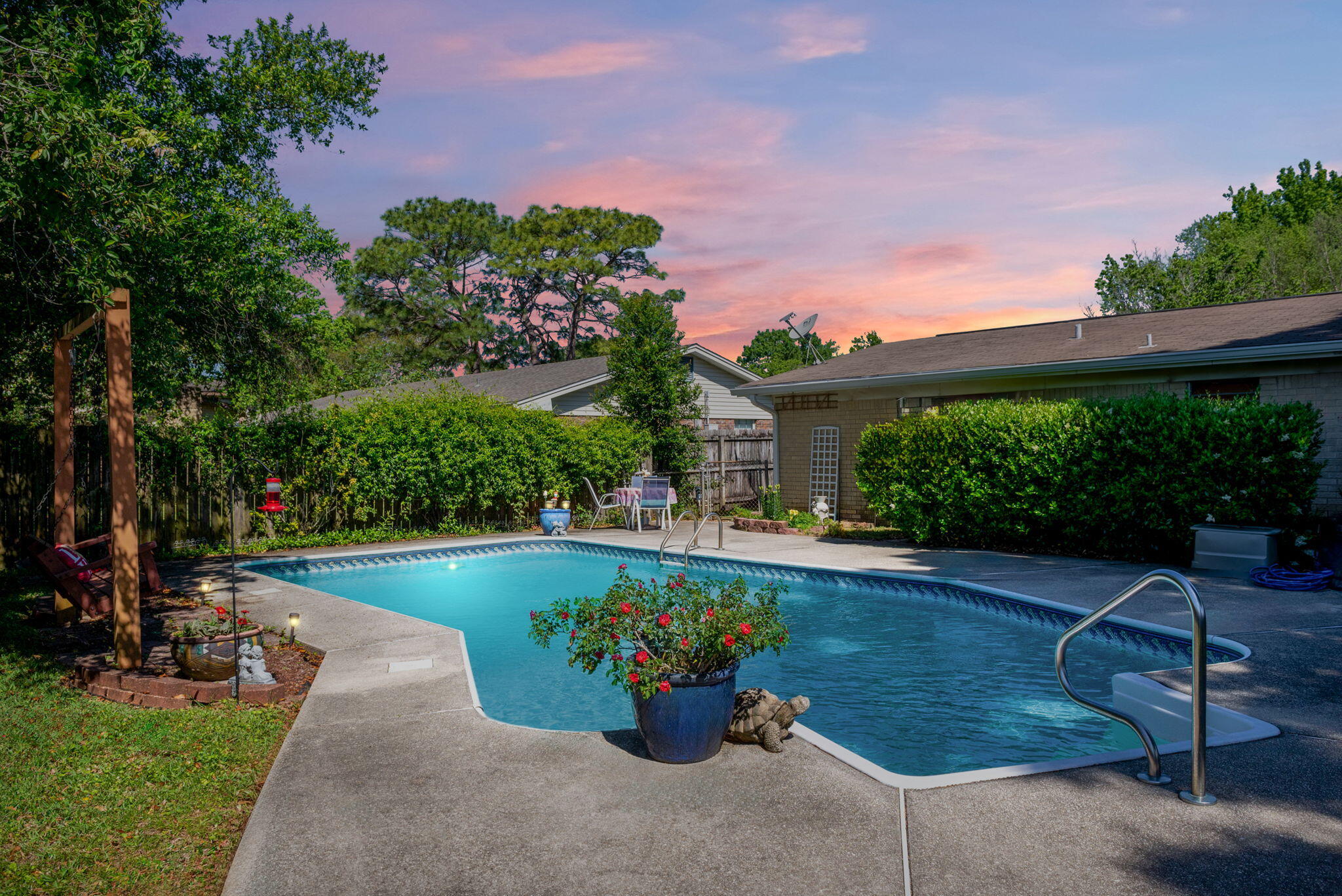 Welcome Home to your own private Oasis; Rare opportunity to live in the great location of Kenwood! This stunning property boasts a 40 x 16 pool with expansive concrete sides, perfect for summer relaxation and entertaining. Pool includes a Polaris vacuum system; Inside, discover a spacious layout featuring 4 bedrooms and 3 baths, complete with elegant parkay wood and LVP flooring throughout. Kitchen has stainless steel appliances; and breakfast bar; One of the bathrooms showcases a luxurious marble-look shower, adding a touch of opulence to your daily routine.Enjoy the convenience of a large laundry-bonus room, offering ample storage space to keep your home organized and clutter-free. Cozy up by the electric fireplace on chilly evenings, creating a warm and inviting atmosphere; Natural Natural light floods the interior through numerous windows, illuminating every corner of this beautiful home. Master Bedroom is flooded with natural light; Master Bath features a raintree shower head; The hallway is enhanced by white brick; adding to the texture of the home; Large Dining Room has an abundance of light with Sliding Glass Doors connecting you to your own Oasis; Outside, you'll find a large, fenced yard, providing privacy and security for outdoor activities and pets. Trees provide home for the many birds you can experience on your patio; Backyard has a yard building to organize all your tools and equipment for maintaining a beautiful yard! Seller is in the process of Probate; Don't miss the opportunity to make this your forever home. Schedule a showing today and experience the epitome of comfort and spend hours in your own sanctuary of the back yard in relaxation!
