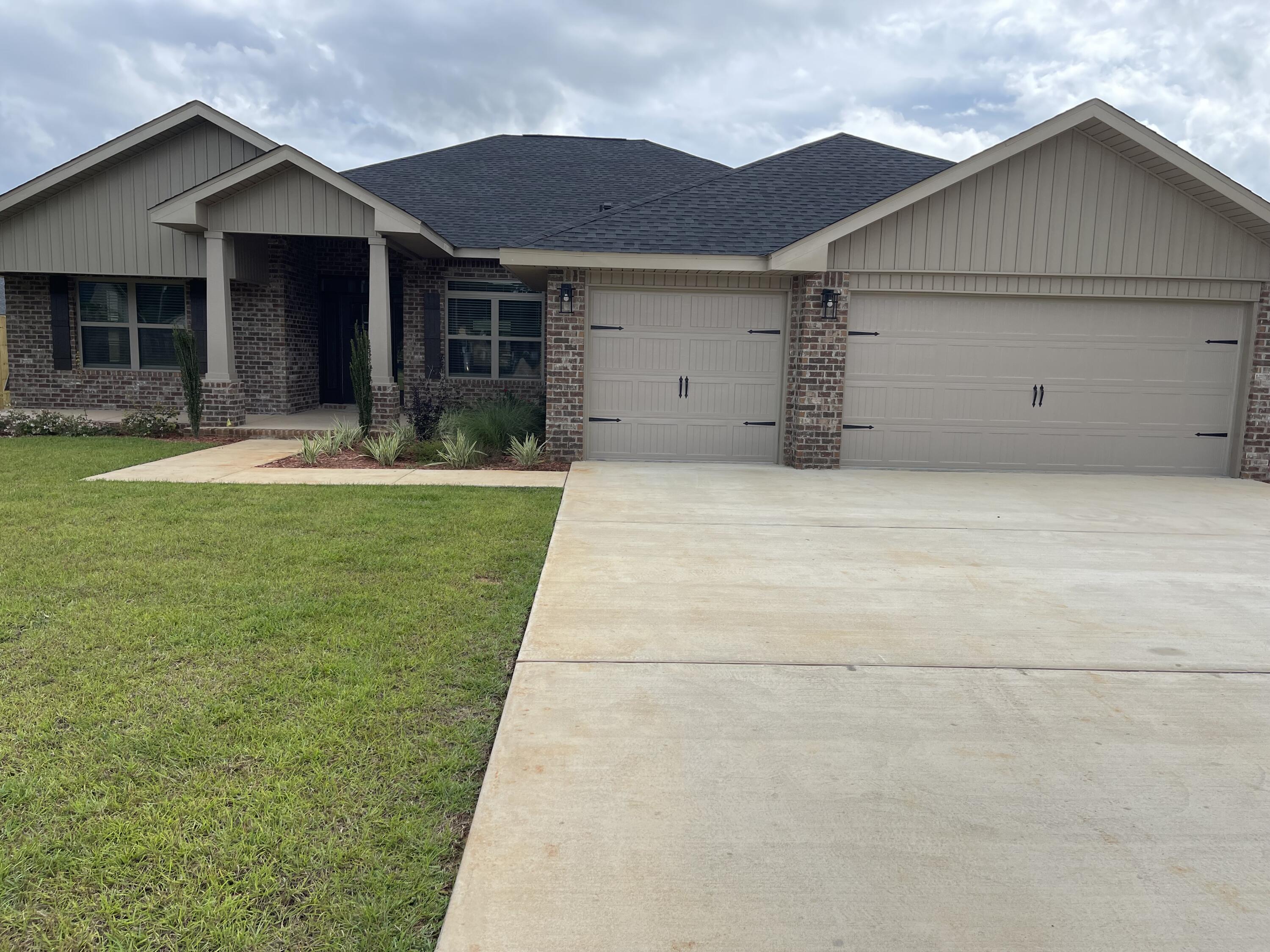 Look no further if you want a four sided brick craftsman style home with a 3 car garage and many other features! This is a 4/3 split bedroom plan that has a formal dining room and flex room to use however you wish. You'll enjoy the covered lanai that can be accessed from both the master bedroom and 3rd bathroom. Upgrades include granite on all countertops, upgraded LVP flooring everywhere but bedrooms. The master bath has both a separate shower and garden tub. The lot is fully sodded and landscaped with sprinklers all around. Dining, shops and schools are al just a quick drive. The subdivision is well lit with decorative lamp posts. This home comes with a 10 yr. Bonded Builders Warranty.