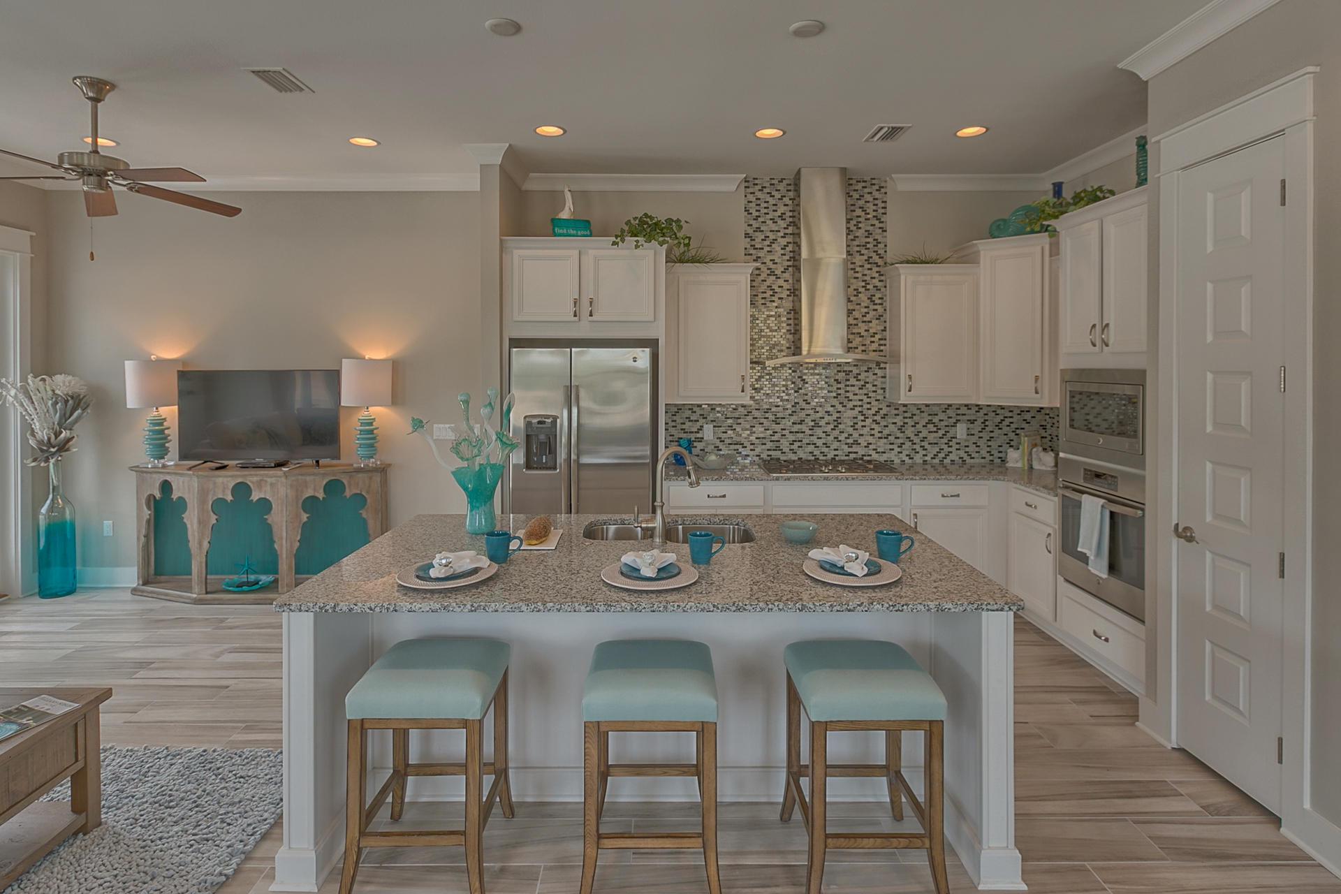 : The Bahamas Triplex Townhome floor plan is uniquely designed to feature 3 bedrooms and 2.5 bathrooms with a 2 car garage. Home features include 10ft Ceilings, hardwood floors, Granite countertops, and stainless steel appliances to name a few. The Town of Prominence is located on HWY 30A between Seagrove and Alys Beach. Residents will enjoy easy access to a beautiful Town Center, Resort style pools, Fitness Center and Private Shuttle Service to the beaches of 30A. ''The Hub,'' the community's town center includes restaurants, shops, and an amphitheater with covered event pavilion, a cinema screen for movies as well as a stage for concerts and events. Subject Property Lot #434
