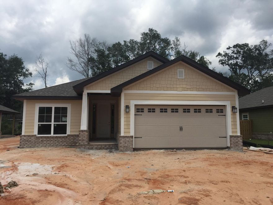 Great Freeport location - less than 5 minutes to Publix and about 15 minutes to the fabulous beaches of South Walton! Durable Hardiboard construction. Screened, covered back porch. Canopies homes have 9' ceilings with 8' entry doors, 2 car garages, stainless GE appliances, Moen fixtures and more! Community pool and playground for owners to enjoy. Builder pays closing costs (except prepaids) with approved lender! 1,2 and 10 year warranties! Low association fee of $360/year! New buyer fee paid by builder at closing!