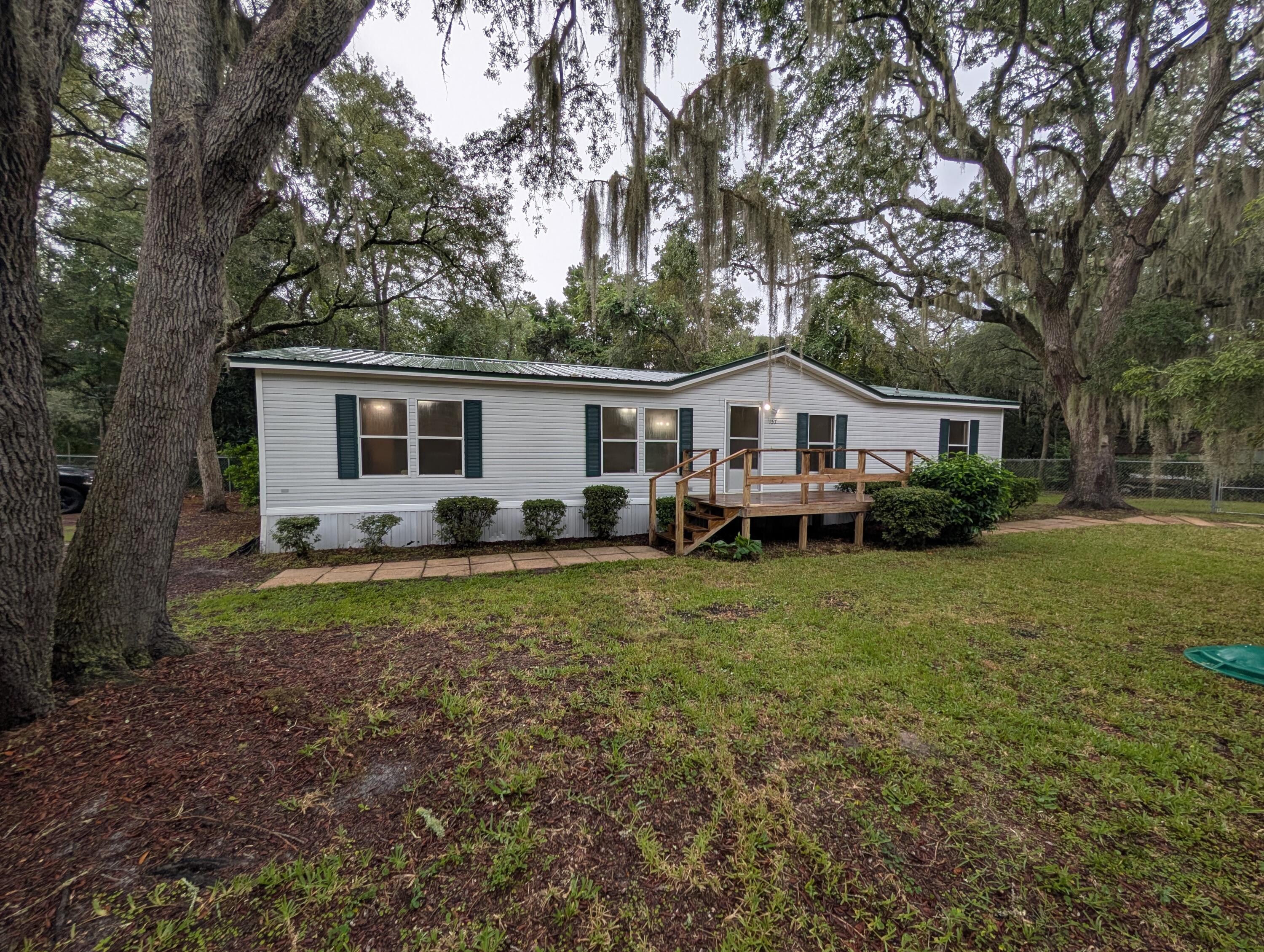 Centrally located and brimming with potential, 157 E Harborview offers a fantastic opportunity to create your dream home in Santa Rosa Beach. This 'diamond in the rough' is ideally positioned for enjoying all that the area has to offer, with easy access to the vibrant lifestyle of 30A, the upscale shopping and dining of Grand Boulevard, top-rated schools, and the natural beauty of local state parks and pristine beaches.Ready for your personal touch, the seller has already laid the groundwork for a fresh start. The home has been deep cleaned, pressure washed, and the interior freshly painted, providing a blank canvas for your design ideas. Major updates have also been taken care of, including a 2022 HVAC system and a durable metal roof that is approximately 15 years old. The property is connected to city water and sewer and features an irrigation system, adding to its convenience and value.
This home is an incredible opportunity for a buyer looking to invest in a prime location and willing to add some TLC to unlock its full potential. Don't miss your chance to turn this well-positioned property into a coastal masterpiece.