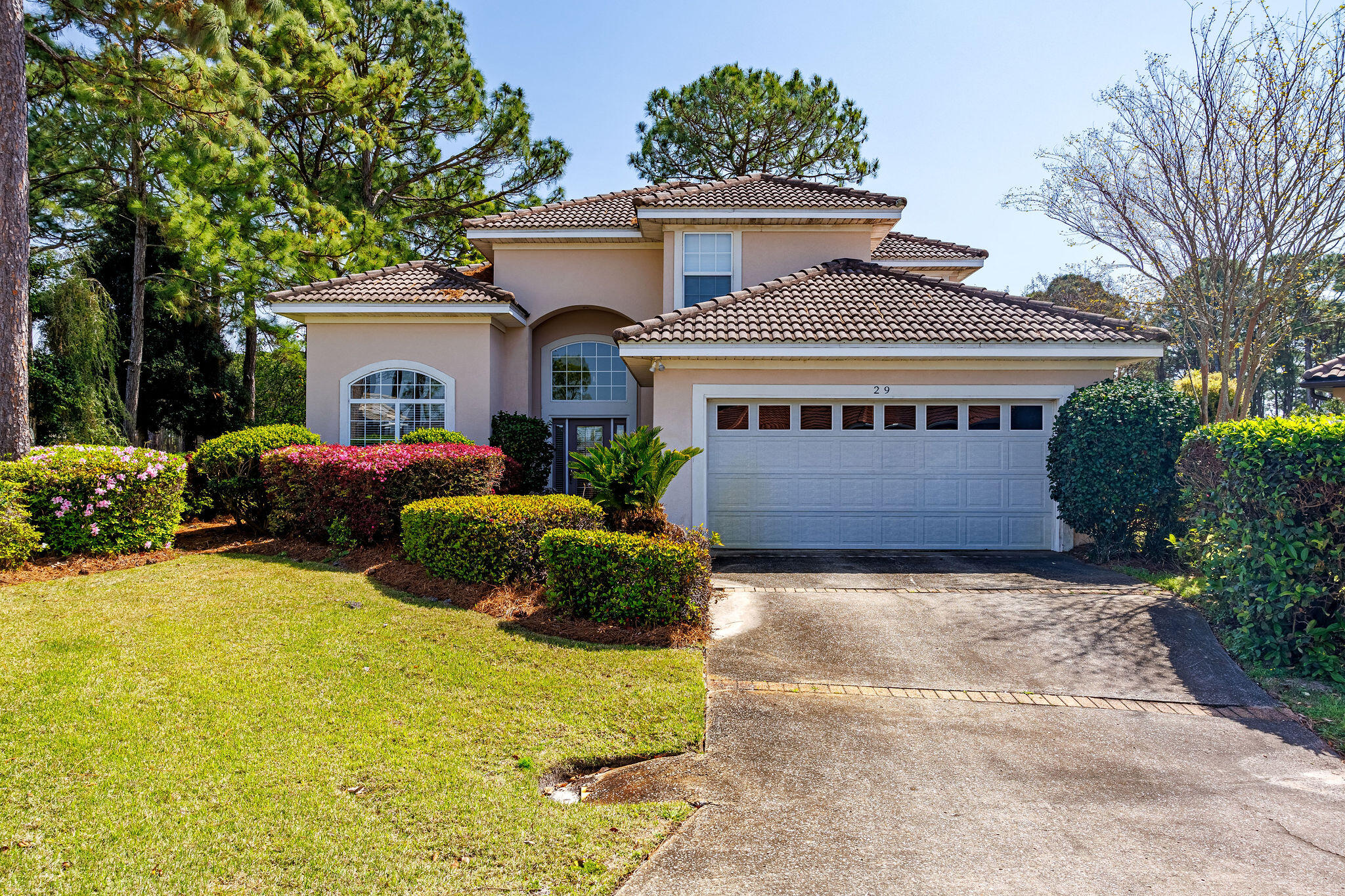 Outstanding ''Custom Built'' Home with an Idyllic Golf Course/ Lake View in the gated Golf Course community of Emerald Bay! Ideally located at the end of the sixth hole29 Ivory Court has a highly desirable layout with the Primary En-Suite located on the first level. Click on the photos to discover all this great property has to offer! The spacious 1 st floor living area is complemented by a nicelyappointed Kitchen with serving bar, large Dining Room, and Breakfast Nook. The Screened Lanai really brings the outdoors in adding to the home's natural light. Thebeautiful staircase to the home's second level leads to an entertainment loft, two additional bedrooms, and full bathroom. To treat yourself to a great 'Quality of Life' New hot water heater, new a/c, new irrigation system too