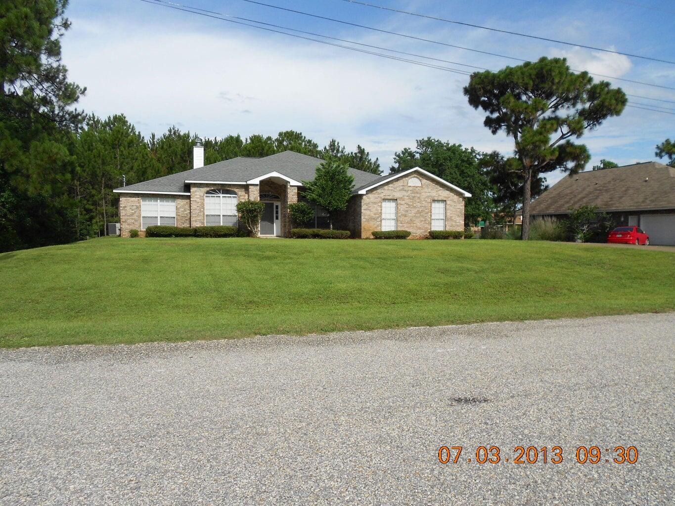 Beautiful Home in the desired Holly By The Sea Subdivision with all the wonderful Amenities it has to offer! This Large 4 Bedroom WITH an Office is located between HURLBURT Field and NAS Pensacola in the Fast Growing Navarre Beach area. Separate Den/Office and a Formal Dining Area allows for room to spread out. Great Room with Fireplace gives the Home a warm, cozy feel. Huge Owner's Suite. 2 Spacious Additional Rooms share a Full Bath. 4th Spacious Bedroom Room has it's own Full Bath with Door to Large Covered Patio. Add a Pool to Maximize your Outdoor Living and Entertainment. Holley By The Sea Amenities include 3 Swimming Pools, a Playground, Tennis Courts, Exercise Room, Sauna and Steam Room, Boat Launch, RV Parking and Community Room. LOADS of Activities for ALL! Don't Miss Out!