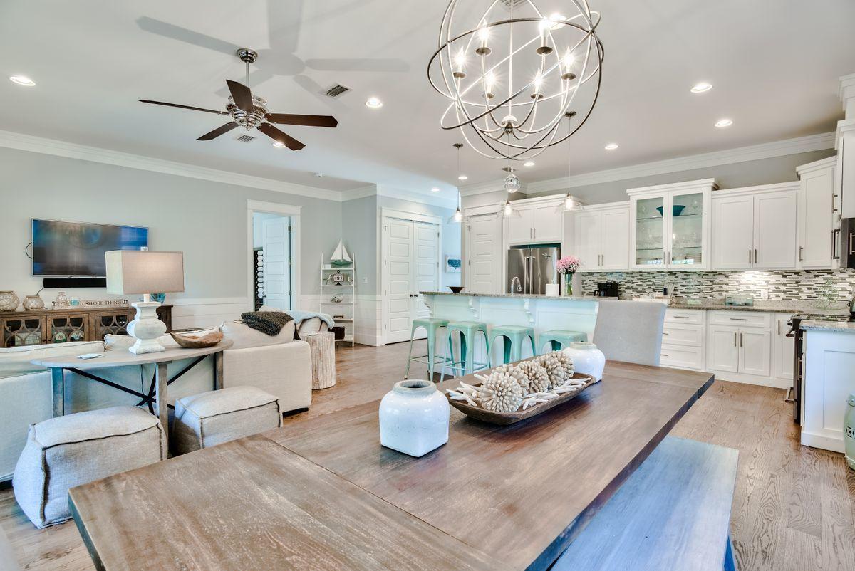 Wouldn't you like to be 'Well Adjusted' in the luxury community of Seacrest Beach? Then let me introduce you to this immaculate beach home, with $88K in rentals booked so far this year. It offers space, privacy and convenience for large families. 3 master suites and the addition of a guest bedroom and large bunk room makes this an excellent choice for different sleeping configurations for multiple families. This Southern charmer, just recently painted, is fitted with matching Kitchen Aid stainless appliances and a floor plan opening up the kitchen and dining areas into the living room that's been appointed with stunning and inviting hues and textures to give the feeling of both warmth and beauty. The gas grilling area, large porches off the living area and 3 bedrooms,