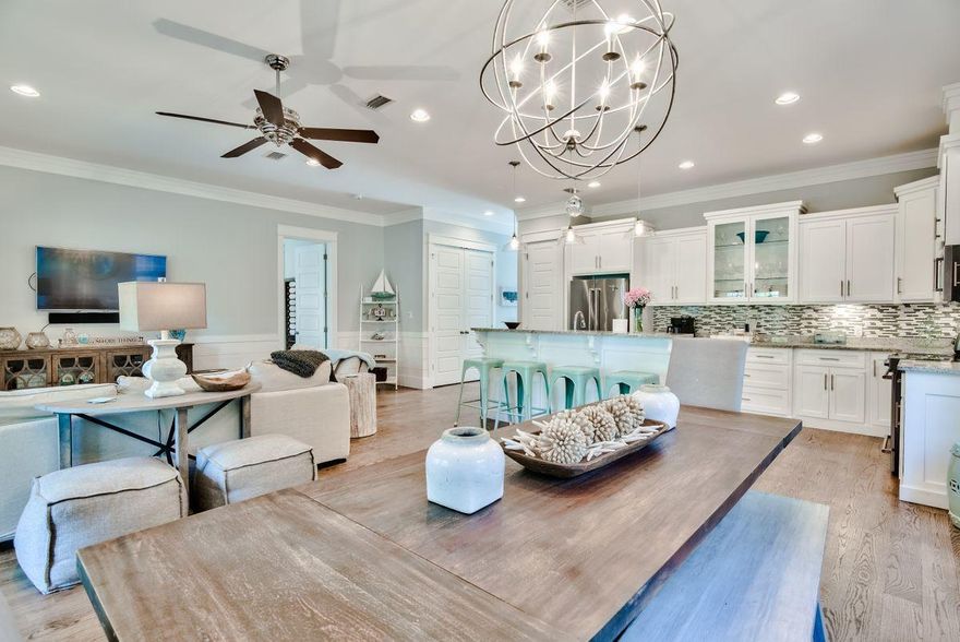 Wouldn't you like to be 'Well Adjusted' in the luxury community of Seacrest Beach? Then let me introduce you to this immaculate beach home, with $88K in rentals booked so far this year. It offers space, privacy and convenience for large families. 3 master suites and the addition of a guest bedroom and large bunk room makes this an excellent choice for different sleeping configurations for multiple families. This Southern charmer, just recently painted, is fitted with matching Kitchen Aid stainless appliances and a floor plan opening up the kitchen and dining areas into the living room that's been appointed with stunning and inviting hues and textures to give the feeling of both warmth and beauty. The gas grilling area, large porches off the living area and 3 bedrooms,