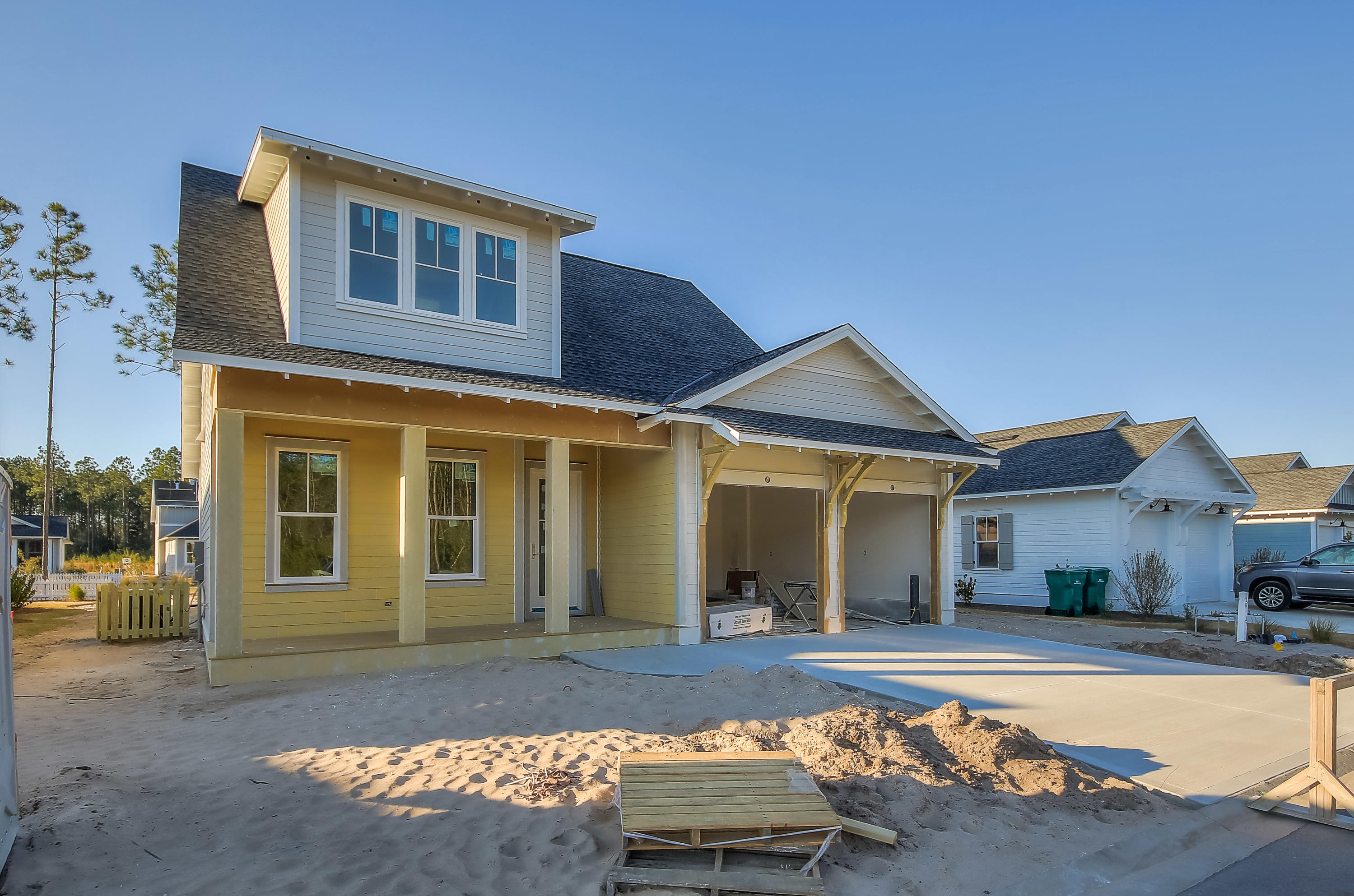 This Coral Bean with study plan offers 2,410 square feet, 4 bedrooms, and 3.5 bathrooms. Estimated date of completion is March 2019. Quality features include 10' ceilings on first floor, Medallion wood flooring throughout, Quartz countertops throughout, LED under cabinet lighting in kitchen, a built-in dry bar with upper and lower cabinets + glass on upper doors, stainless steel appliance package + upgraded vent hood, upgraded tile in master bathroom, shiplap accent wall in the living room and in the master bedroom, and a stub for gas grill off the back porch. Please verify builder-chosen upgrades/options with sales agent.