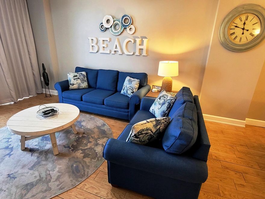 CURRENTLY UNDER CONTRACT, SELLER ACCEPTING BACKUP OFFERS. Don't miss out on this one! This recently upgraded gorgeous Panama City Beach condo offers incredible views of the beach and a great floorplan. This special condo includes nearly all new furniture and new paint! And the AC and hot water heater were replaced in 2019. And there is no carpet in the unit! An open concept kitchen, dining area, and living room are spacious and all offer spectacular views of the gulf. The living room comfortably seats 6 and also has a queen sleeper sofa. Enjoy watching the game or your favorite TV shows on the new 65'' smart TV & DVD player. Walk out onto the oversized balcony from the living room for a view of the world's most beautiful beach!