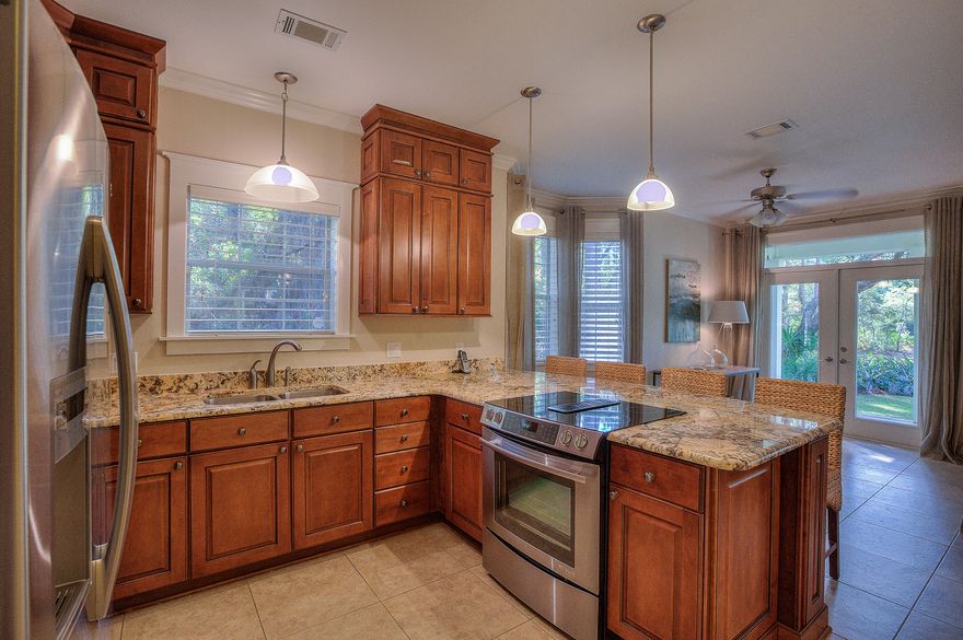 Enjoy one of South Walton's hidden gems. The Shallows is located just north of 98 between Highway 283 and Highway 395. This home location is arguably one of the quietest streets around. Located one lot from the Bay and minutes from the beach you can have the best of both worlds. This is a 3 bedroom 2 and half bath with updated kitchen, granite countertops, breakfast bar, stainless appliances, travertine floors downstairs and hickory hardwood upstairs. Periodically see deer and other wildlife in your backyard.