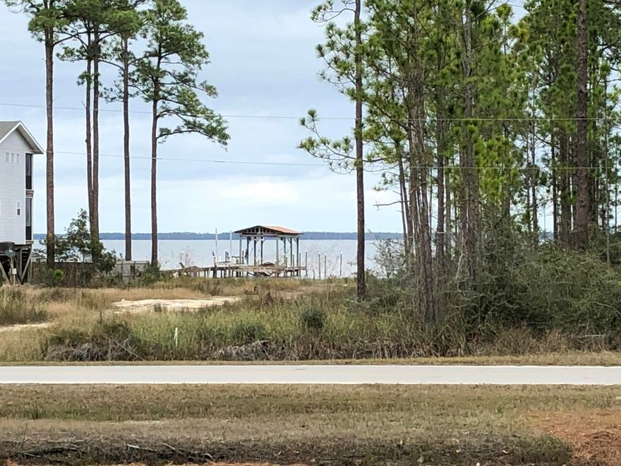 FANTASTIC BAY VIEWS, LARGE LOT, QUIET NEIGHBORHOOD. WRAP AROUND PORCHES, HEATED IN GROUND POOL WITH SEPARATE HOT TUB PLUS PRIVATE COURTYARD. OPEN FLOOR PLAN, GRANITE COUNTER TOPS, FIREPLACE IN GREAT ROOM, 1ST FLOOR BEDROOM, DINING ROOM, BREAKFAST BAR. 2ND FLOOR HAS MASTER SUITE AND BATH, FAMILY ROOM, EXTRA BEDROOM AND FULL BATH. COULD EASILY BE 5 BEDROOMS BY SECTIONING OFF 13 FEET OF SECOND FLOOR FAMILY ROOM. REVERSE OSMOSIS WATER SYSTEM. LARGE (10'x 24') FRONT PORCH OVERLOOKING BAY, SCREENED LANAI (10'x30'). HEATED IN-GROUND POOL.