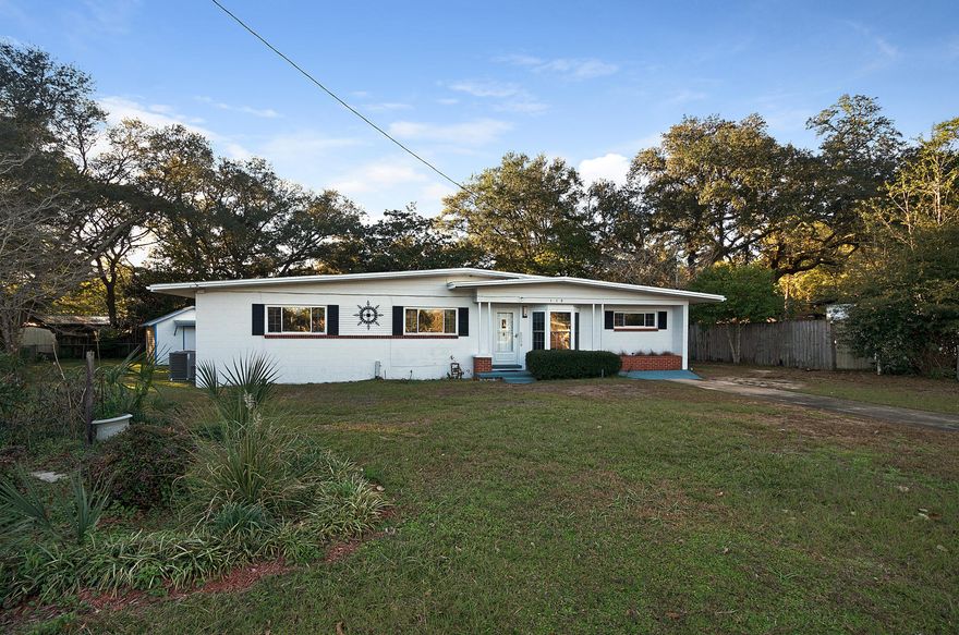 Beautifully updatedBig enough for the entire familyand in a Great Location!! With 2284 sq. ft. under roof this home has so much to offer for the price! The main section of the home consists of three bedrooms, two bathrooms, an entry living area, a charming family room with wood burning fireplace, and a centrally located kitchen with granite countertops. Adjacent to the family room is a large screened in porch looking out to a very peaceful backyard setting complete with a16 x 12 Workshop/shed, adorable covered swing, and a gazebo. Directly across the street enjoy the convenience of a large park for healthy outdoor activities. In the Heart of Niceville very close to Ruckel Middle School and Niceville High School. Come see it today!