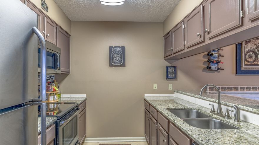 Highly sought after 2 Bed 2 Bath GROUND FLOOR UNIT. New HVAC, Granite countertop, New Stainless Steel Appliances with warranty, tile floors in the main living areas, and carpet in the two bedrooms. Pointe of View has a community pool and fitness center. Walking distance to Grand Boulevard, Publix, Sacred Heart Hospital, and Boulevard 10 movie theater. Just minutes to the beaches of the Gulf of Mexico. Buyer to verify all info and measurements. Short Term Rentals Allowed.