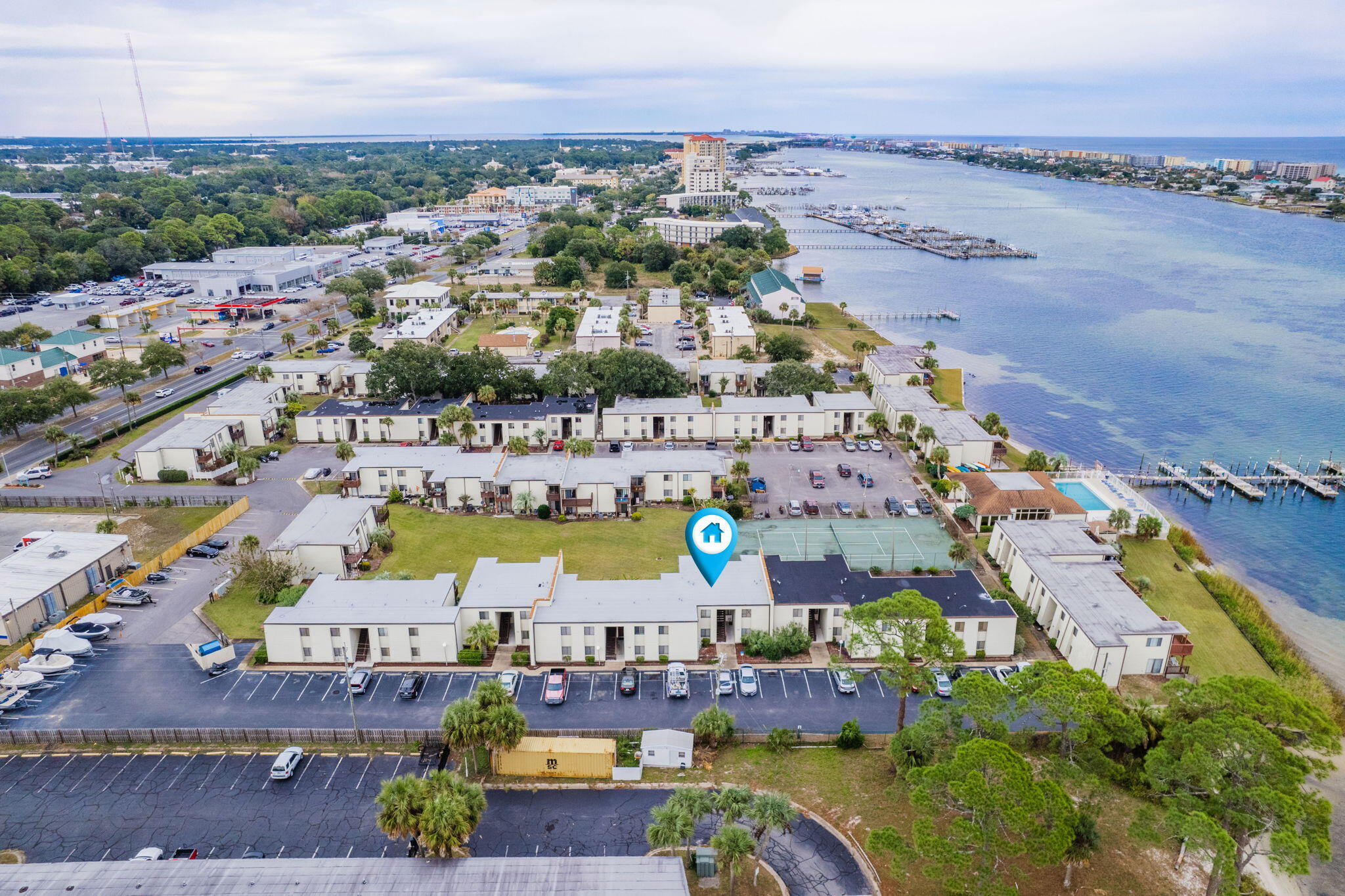 Waterfront local community with no Short Term rentals allowed. Welcome to the Fountainhead Condominium Complex, a picturesque waterfront community located at 308 SW Miracle Strip Parkway in Fort Walton Beach, FL. This charming 1 bed room 1 bathroom bottom floor unit has been refreshed and ready for your  low maintenance costal living. This complex offers an array of exceptional amenities designed for leisure and recreation, making it an ideal place to call home. Residents can enjoy sunny days at the waterfront pool, unwind on the private sandy beach, or gather with friends and family in the community clubhouse, which features a kitchen and recreational facilities. For those who love staying active, the well-maintained tennis court is perfect for a friendly match. Boating and fishing enthusiasts will appreciate the convenient access to boat docks along the Santa Rosa Sound.

The Fountainhead Condominium Complex is perfectly situated near beautiful beaches, including Okaloosa Island Beach and Fort Walton Beach Landing Park, both offering opportunities for sunbathing and water activities. Nearby parks, such as Liza Jackson Park and Ferry Park, are just a short drive away, providing green spaces for outdoor enjoyment.

For those who enjoy boating, the nearest boat launch is located at Fort Walton Beach Landing Park, approximately 1.5 miles from the complex. The community is also conveniently located about 5 miles from Hurlburt Field Air Force Base and approximately 8 miles from Eglin Air Force Base, making it an excellent choice for military personnel.

In addition to its recreational offerings, the Fountainhead Condominium Complex is close to retail and dining options, with Target just 2 miles away and the vibrant downtown Fort Walton Beach, featuring an array of shops and restaurants, only about 1.5 miles from your doorstep.

Experience the best of coastal living in this inviting community, where comfort, convenience, and recreational opportunities come together to create a truly exceptional living experience.