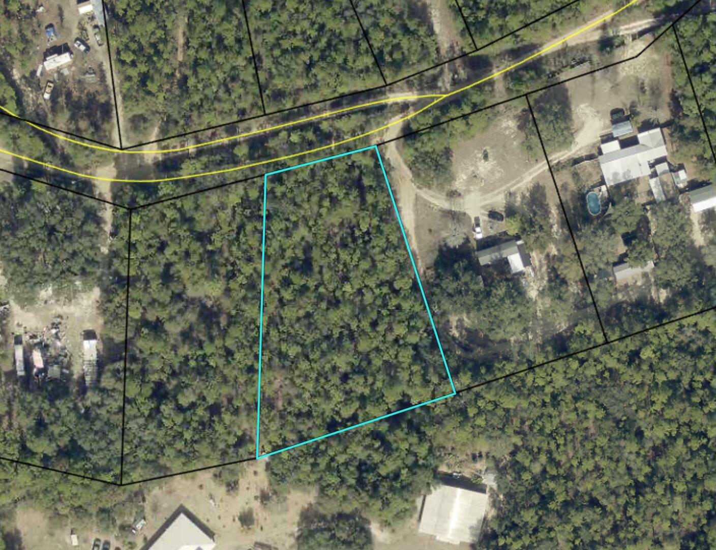 Prime Vacant Land Opportunity in Rural Okaloosa CountyThis exceptional 1.03-acre vacant residential lot on Sundance Way offers an ideal canvas for your dream home in the peaceful, rural community of Holt, Florida. With 179 feet of road frontage and 44,867 square feet of usable space, this property presents unlimited potential for custom home construction in a serene, wooded setting.