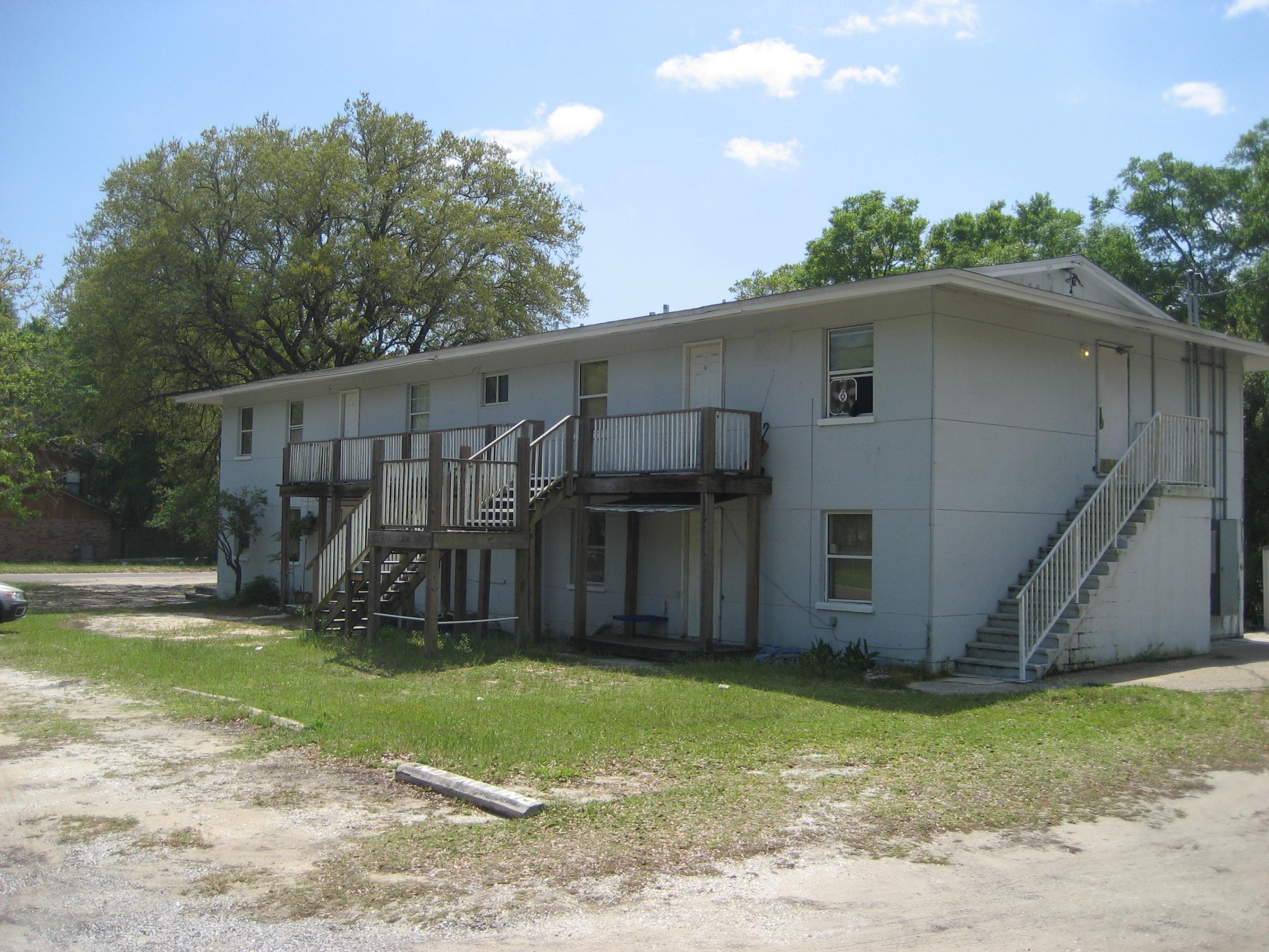 3 parcels: 1 is 75x75 (duplex), one is 75x75, (fourplex), one is 75x150 (dorm). Duplex and fourplex zoned multi family 9 or less; Dorm zoned multi family 10 or more. If the buildings are torn down, zoning will become single family residential with two houses allowed, unless a zoning change is applied for and granted. Allow 2 months for this process. Duplex built in 1956, 2 bedrooms, 1 bath. Fourplex is 1 bedroom, 1 bath. Dorm has 10 rooms.