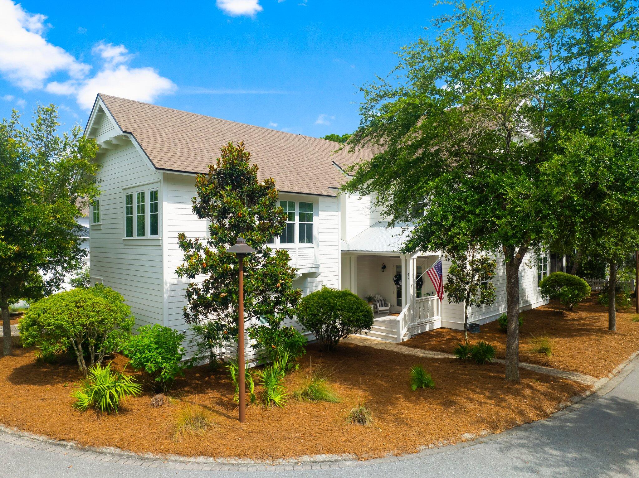 Nestled within a serene, wooded enclave in the sought-after Watersound West Beach community, this exquisite 5-bedroom, 5.5-bathroom residence is situated on an oversized corner lot, offering unparalleled privacy and tranquility. The main part of the home showcases a luxurious first-floor primary bedroom with en-suite bath, alongside a gourmet kitchen and inviting living and dining areas, designed for both comfort and sophistication. The second-floor features three additional bedrooms each with en-suite baths, providing ample space for family and guests. A double bunk niche and a versatile family/bonus room further enhance the appeal of this coastal retreat.  Additionally, this home features a separate carriage house with fully equipped kitchen, living room, and private bedroom and bath.