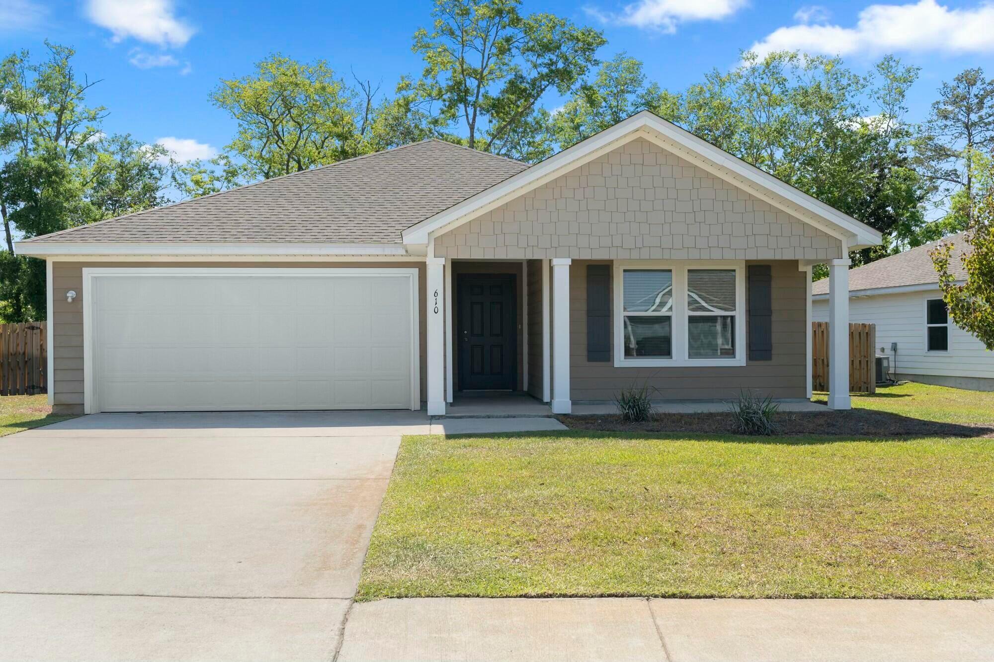BEAUTIFUL 4 bedroom, 2 bath Single-Story Home in the newest Freeport neighborhood, Riverwalk! This home sits on one of the only offered lots close to the community dock. The walkway to Lagrange Bayou dock is a peaceful and safe stroll to catch the sunset or bring your fishing pole and you may catch a fish! The fenced back patio sits on a wooded area that will never be built. Plenty of storage with your 2 car garage and closets throughout! Riverwalks location is 20 minutes to 30A, 5 minutes to Grady Brown Park (the bay) and roughly 15 minutes to interstate 10. So much to see and you are right in the middle of it!