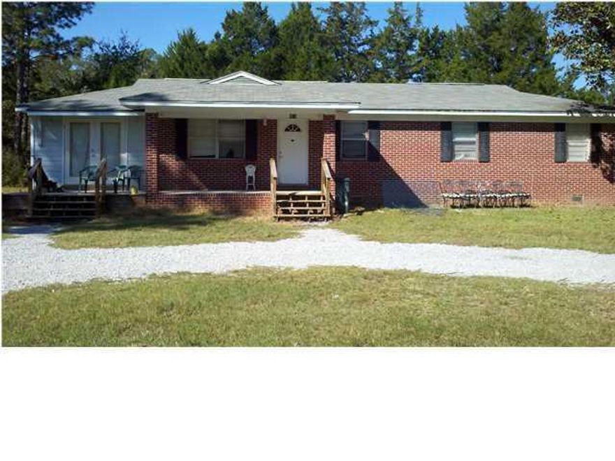 Two properties with separate legal descriptions. Keep one and sell one or enjoy both parcels together. 145' Hwy 20 frontage on a half acre lot with additional half acre lot containing 1,500+/- sq.ft. ranch style brick home. Located just East of Freeport before the entrance to Windswept Dunes. Currently utilized as rental property investment.