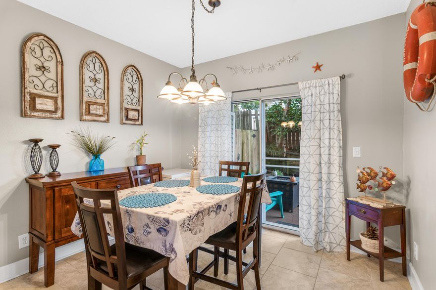 Great Location, in the heart of Destin. This  2 bedroom 2.5 bath townhome has been well kept, renovated and boasts many upgrades.  New HVAC 2019, water heater 2018, dishwasher 2019,  microwave 2019, hurricane windows guest bedroom 2019, carpet 2019,  and upper level bathroom Lifeproof brand flooring 2020.  Beautiful hardwood floors in the living area, as well as granite countertops. Upstairs there is a large master suite with separate walk in closet.  Private backyard oasis with active lemon, orange and peach trees.  Community pool and one car garage. Close proximity to local area attractions, restaurants, attractions, and the sugar sand beaches and emerald green waters of the Gulf of Mexico. Washer and Dryer do not convey.  Living room tv to remain.