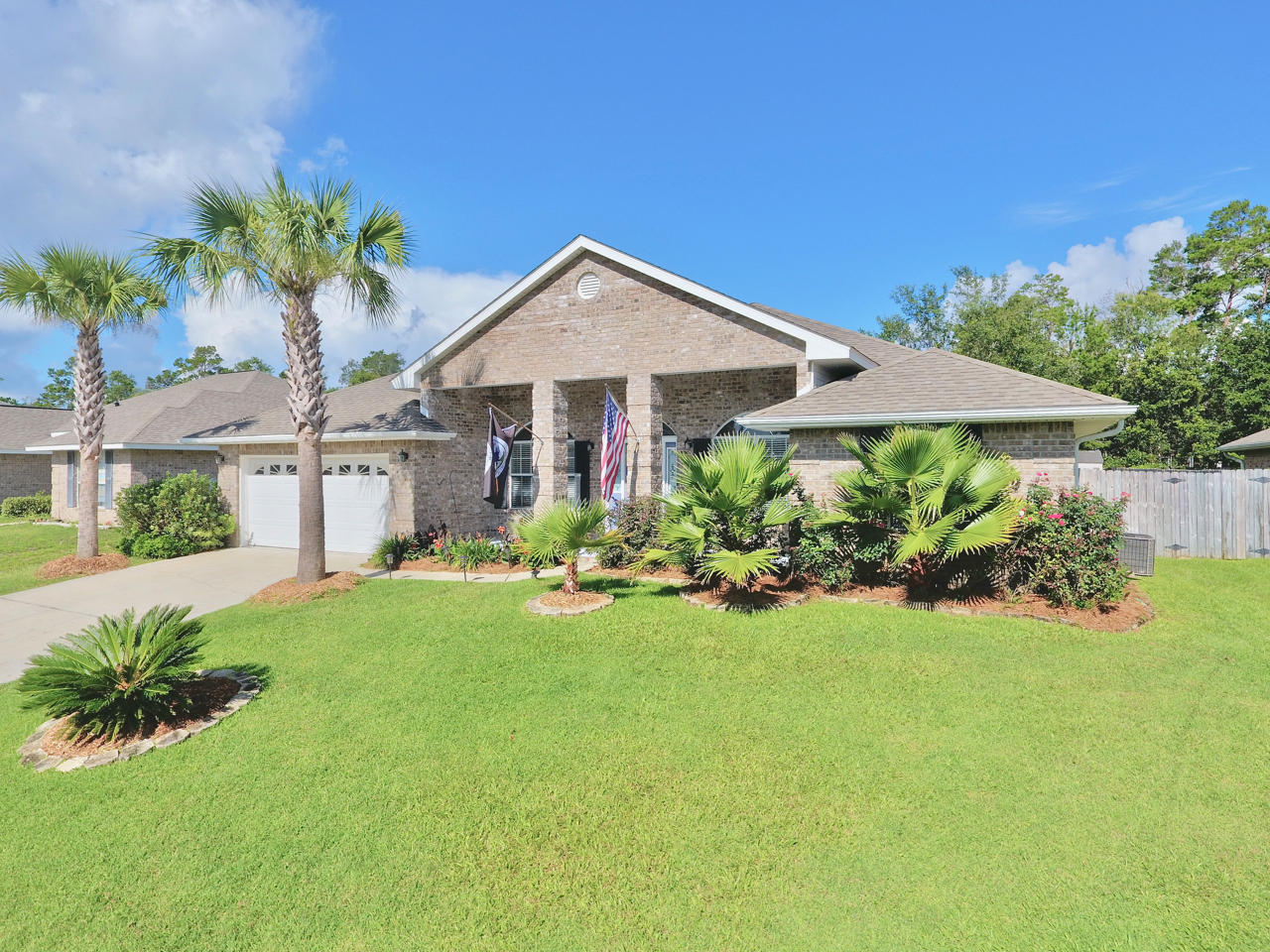 Located in West Navarre, this home features 4 bedrooms and 2 bathrooms, formal dining room, eat-in kitchen, great room and office with two covered porch areas. The great room boasts hardwood flooring and vaulted ceilings with abundant windows providing lovely natural light! The kitchen boasts granite countertops with tall ceilings, upgraded lighting features, new stainless steel appliances, gas cooking and large windows! Master Bedroom features french doors to the covered porch and upgraded bathroom with new sinks and countertops with tile flooring. Large fenced in level back yard offers plenty of space for entertaining and a future pool, also includes a storage shed. Must see home within minutes of Navarre Beach, shopping and entertainment. Less than 20 miles commute to Hurlburt Field.