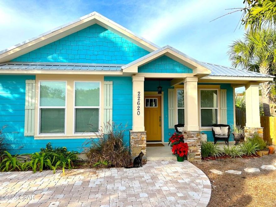 'CURRENTLY UNDER CONTRACT, SELLER WILL CONSIDER BACKUP OFFERS' Welcome to your dream beach getaway! This exquisite craftsman-style home, built in 2022, offers the essence of coastal living just two blocks from the pristine sands of the beach. Boasting 3 bedrooms and 2 bathrooms, this property features an outdoor shower for convenient post-beach rinses, while the fully fenced backyard ensures utmost privacy. Inside, indulge in the latest in design and construction quality, with stainless steel appliances and granite countertops adorning the kitchen. The beautiful bathrooms showcase custom tile showers, while crown molding and modern fixtures add an elegant touch throughout the home. Whether you're lounging indoors or embracing the coastal breeze outside, this beac