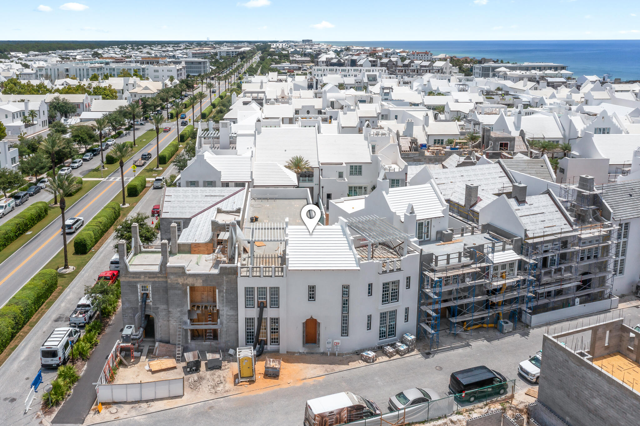 20 Fairwind Lane is a large south of 30A Custom Home offering 5,805sf and 62 feet of frontage on Sea Garden Street in Alys Beach. A dramatic 3 story spiraled stair with glass elevator architecturally defines the home's entry. The entire 3rd floor is utilized as a Mediterranean inspired rooftop terrace. 4 bedrooms plus bunks make up the main house and a rarely found separate carriage house above the two-car garage delivers a private living area and 5th bedroom. The kitchen, living, dining area and first floor bedroom all look out to the private courtyard with plunge pool. Designed by Stackable Mracek Design Group and currently under construction by Galvas Construction with an anticipated completion in late summer of 2025.