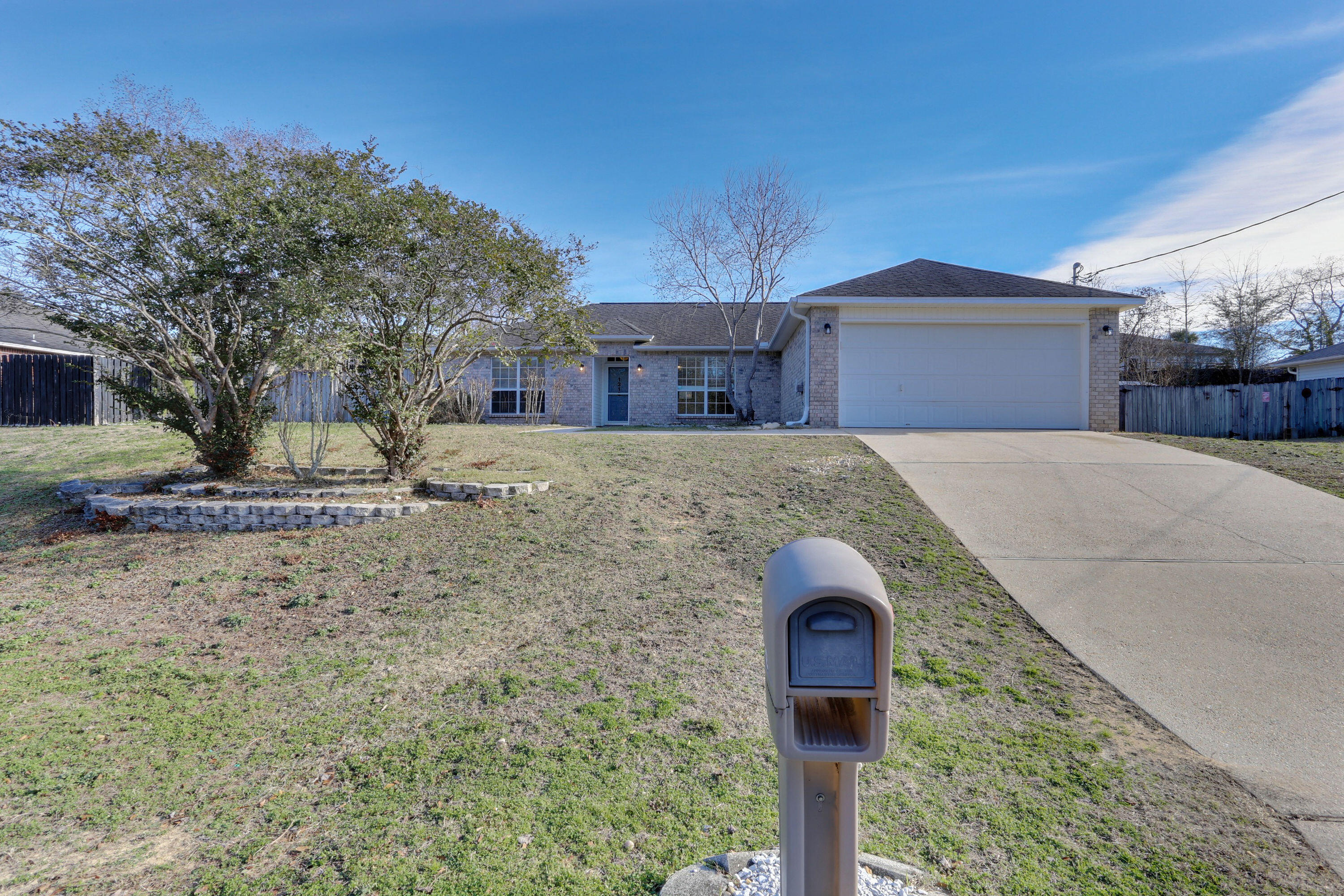 Come Experience this 3 bedroom/2 bath/ 2Car Garage home located in the sought after subdivision of Northview Estates. The home welcomes friends and guest alike with cathedral ceilings in the family room accented with a wood burning fireplace and laminate flooring. The kitchen features granite countertops, tile backsplash, ample cabinet and counter space for food prep. The master suite features dual vanities, attractive tiled backsplash and tub surround with a large walk in closet. The additional bedrooms are nice sized with ample closet space. The entire home has been freshly painted throughout in agreeable gray walls and white trim with new carpet installed in the bedrooms. The roof will be replaced prior to closing with acceptable offer. Water heater replaced 2023. HVAC 2018. Schedule your private showing today!
