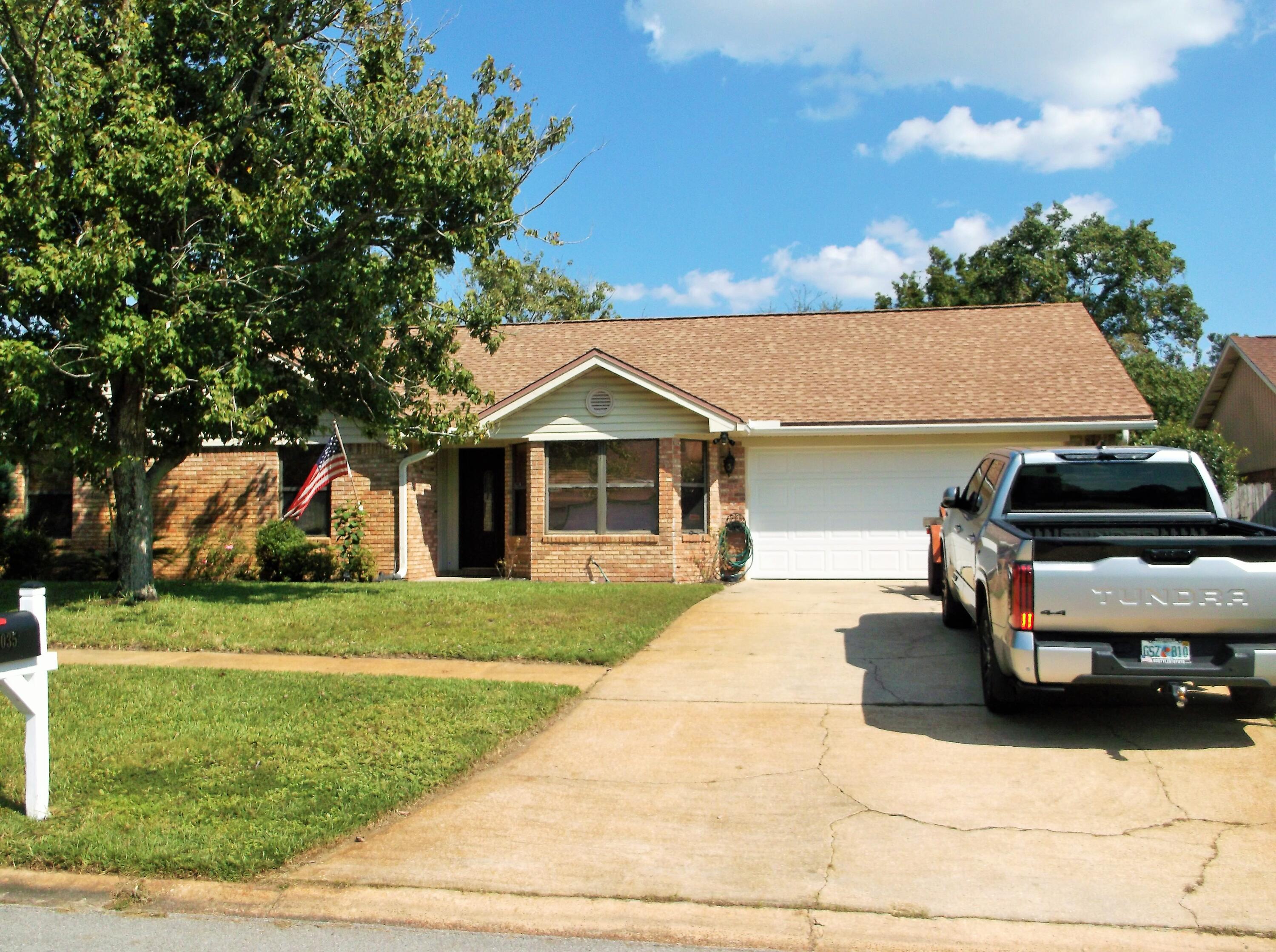 Updated home in a  neighborhood that has sidewalks.  Approx 4 miles from Hurlburt AFB front gate and 10-15 minutes to Navarre Beaches. Living room w/cathedral ceiling & gas fireplace, spacious dining room and a breakfast nook separated by your galley kitchen w/gas stove and granite countertops that waterfall over the side. Luxury vinyl plank flooring, a tankless water heater and newer HVAC unit 2016.  Relax in the Florida room w/tongue & groove wood walls & ceiling.  Backyard has covered patio; a great storage shed & backs up to woods for additional privacy.  Roof 2016. Tankless water heater