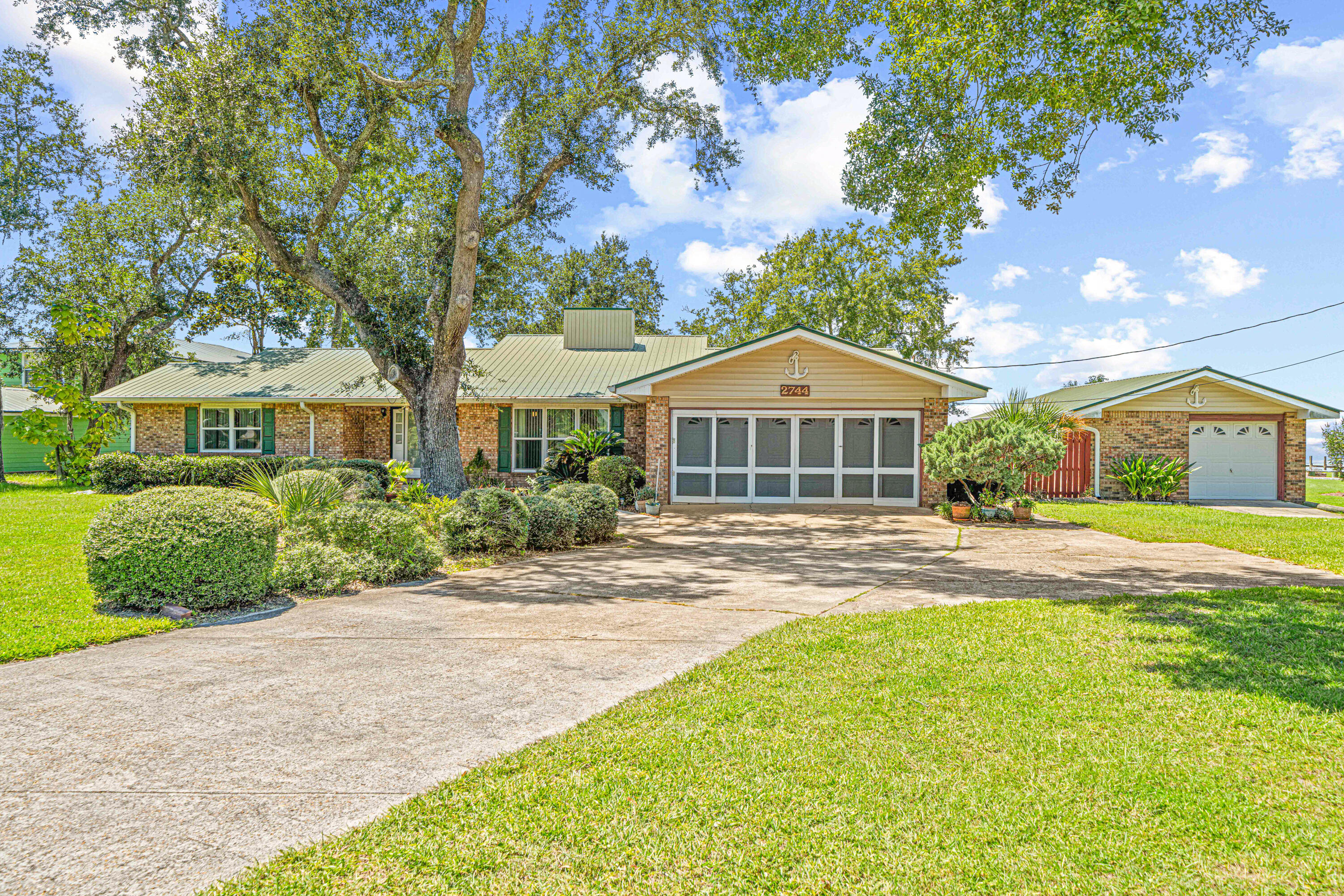 Experience true waterfront living in this charming 3-bedroom, 3-bath Florida cottage offering 1,835 sq. ft. of well-designed space. Built in 1980, this solid brick home sits on TWO expansive waterfront lots overlooking the stunning Choctawhatchee Bay. This home features spacious living areas with timeless character, split-floor plan with a large Florida room and water views from every bedroom! Detached carport & outdoor storage shed - Large yard with direct bayfrontage - Spectacular sunsets across Choctawhatchee Bay - NO HOA! This property is a haven for water enthusiasts. With direct access toboating, fishing, and swimming, you'll enjoy endless days on the bay.Just down the street, Grady Brown Park offers boat launches,playgrounds, and splash pads for family fun. Located only 10 minutes from the world-class beaches of South Walton and close to shopping, dining, and entertainment, this home perfectly balances relaxation and convenience.Schedule your private showing today and discover waterfront living at
it's finest!