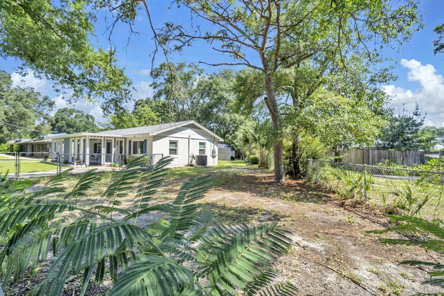 Avoid the traffic and move into this charming home less than 3 miles from Eglin AFB.  Over $175k was spent updating this 4 bedroom, 2 bathroom home.  No expense was spared when the owner replaced the HVAC, roof, water heater and vinyl double hung windows in 2021.  The kitchen was completely remodeled with white shaker cabinets, granite countertops, and stainless-steel appliances.  Both bathrooms were completely remodeled with new vanities and walk in tile showers.  No carpet here...luxury vinyl plank throughout the home. Outside is a large covered front porch and two driveways.  Enter the gate on the side of the house and park an RV, boat or jet ski.  The backyard is fully fenced with an outdoor shower and two sheds.  and plenty of room for a swimming pool! Lincoln Park is less than a half mile down the road that offers a swimming area, docks, picnic area, restrooms, showers, playground equipment and a 24-hour boat ramp.  This home is in a perfect location and like new condition!  