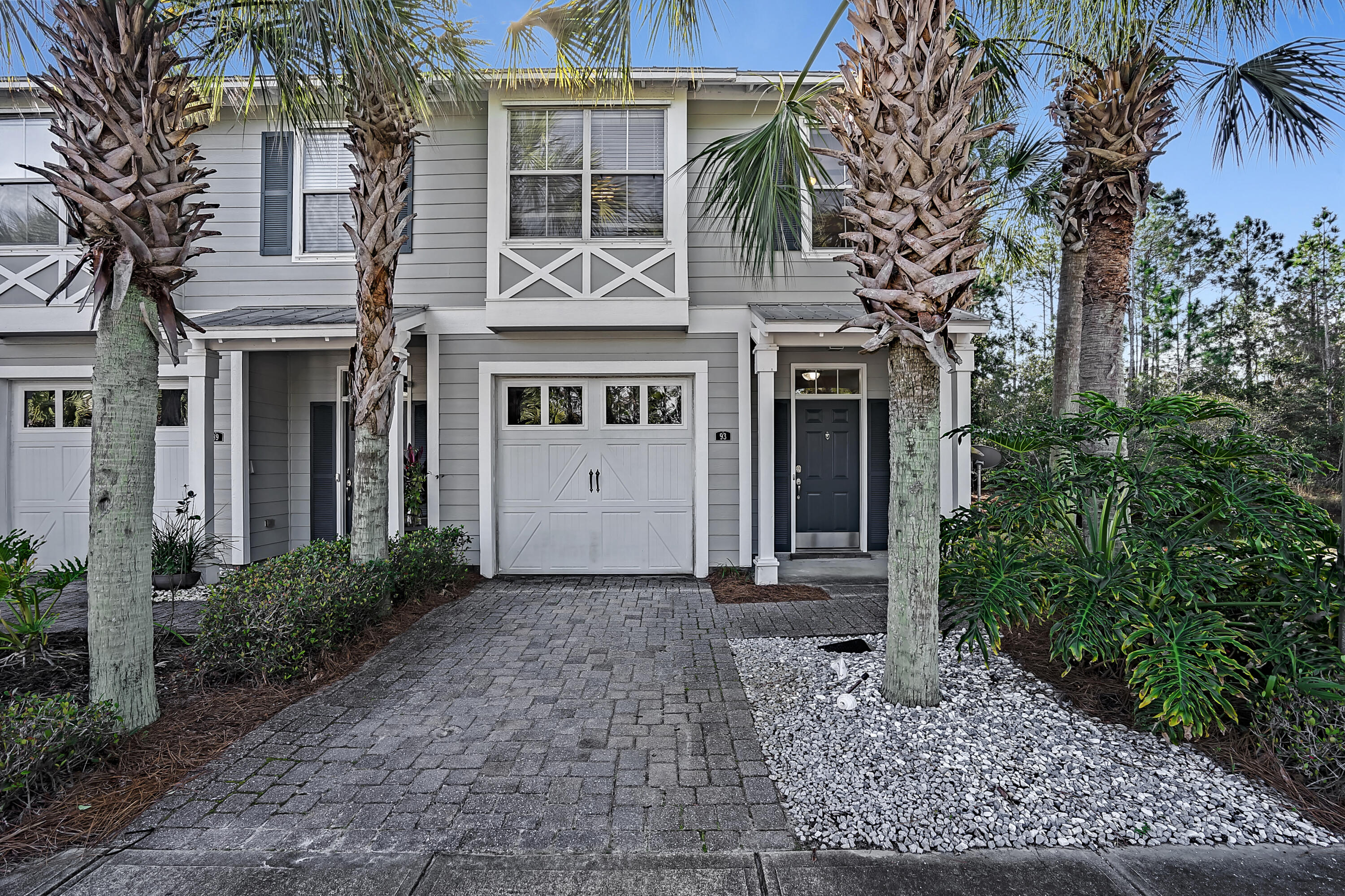 Enjoy easy living in the peaceful community of Eagle Bay. Perfect for couples, small families and early retirees, this 2-story townhouse is an end unit with an open floor plan accentuated with 9' ceilings, crown molding and sizable common areas. The kitchen features granite countertops, stainless steel appliances, wooden cabinets and a built in wine rack. Upstairs you'll find sizable bedrooms and an oversized master with tray ceilings and a large walk in closet. This opulent residence truly has it all, and is even conveniently located less than half a mile to the bay with public access, 5 miles to 30A, along with being minutes to shops, restaurants and weekend fun. Don't miss out on this opportunity, and schedule your private showing today!