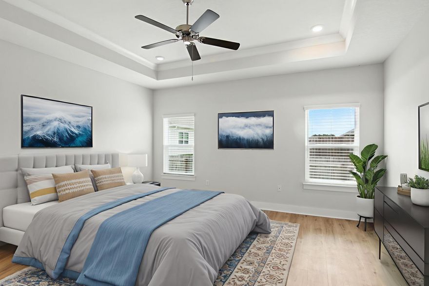 Welcome to this stunning 5-bedroom, 3-bath home built in 2022. VA eligible ask about assumption loan option of 5.1%. Home offers peace of mind with a 10-year builder's structural warranty. This spacious home features an open-concept layout with tray ceilings, recessed lighting, crown molding, luxury vinyl plank flooring throughout, and custom fit plantation shutters. The kitchen is a chef's dream with stainless steel appliances, granite countertops, built-in wall ovens, a built-in microwave, and a generous walk-in pantry. The split floor plan offers a private primary suite with a large walk-in closet, dual vanities, garden tub, and separate tiled shower. Enjoy a fenced backyard, covered patio, and two-car garage in a prime Gulf Breeze location. This home is an easy 30 minute commute to Hurlburt Field and 40 minutes to NAS Pensacola. 