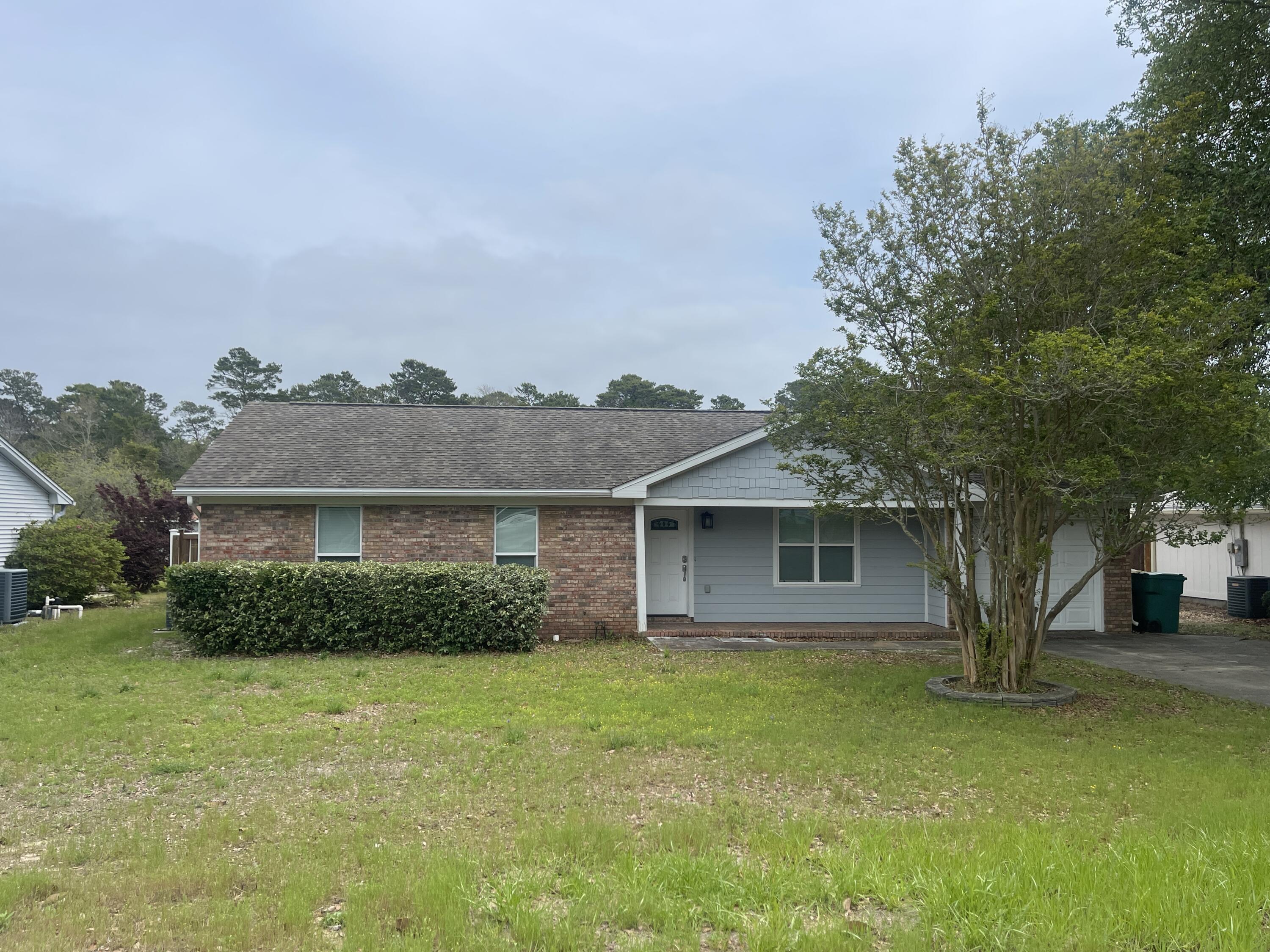 Available for lease from March 19 through October 31. Can be rented furnished or unfurnished.Super cute 3-bedroom, 2-bath brick home on a HUGE lot--if you love the Destin harbor, this is the home for you! Recently renovated, this house boasts a spacious living room, a kitchen with granite countertops, shaker-style cabinets, stainless steel appliances, and a formal dining area.The massive primary suite features an en suite with dual vanities, granite countertops, a walk-in shower, and a separate garden tub. It also includes a sitting area, an office space, and a large walk-in closet with built-in shelving. The two additional bedrooms are generously sized and share a full guest bath. Additional highlights include a 1-car garage, an enormous laundry room with a washer and dryer included, and a gigantic, privacy-fenced backyard complete with a deck and shed. No carpet and no popcorn ceilings!

Owners may consider pets on a case-by-case basis with prior approval and a non-refundable pet fee. No smoking of any kind, including vaping.